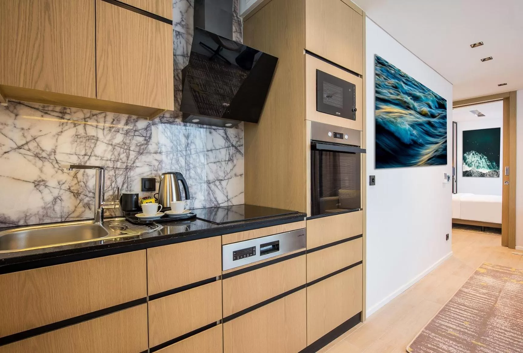 Kitchen or kitchenette in WestSide Residences by Rotana