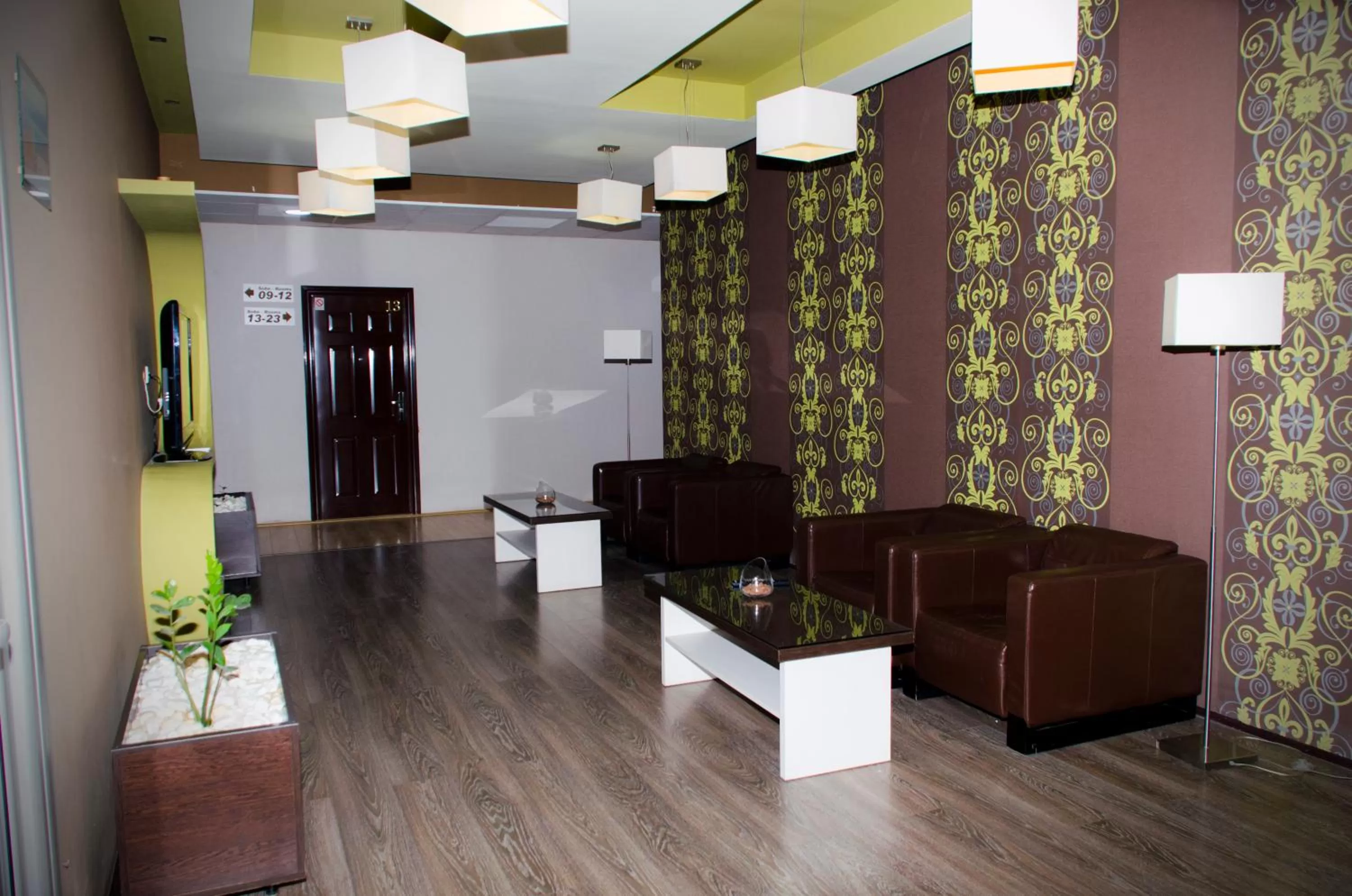 Communal lounge/ TV room in Garni Hotel Tri O