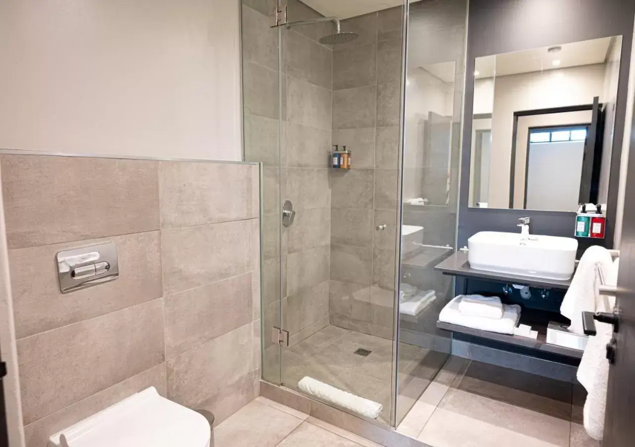 Bathroom in The Catalyst Apartment Hotel by NEWMARK