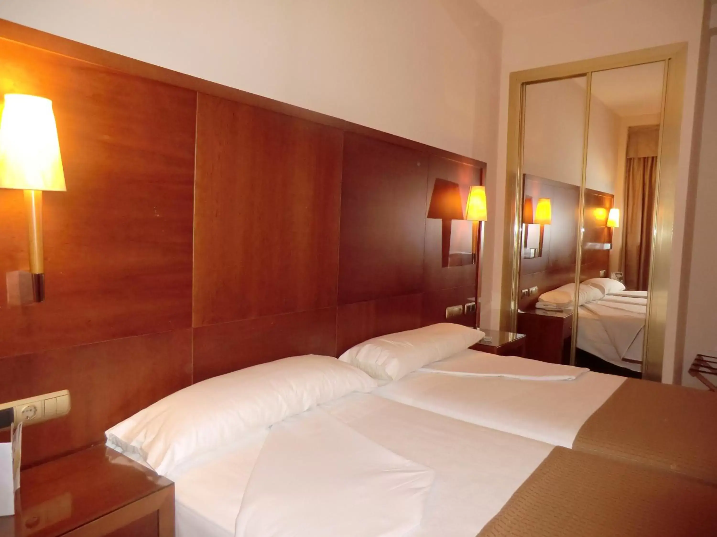 Bed in Hotel Saylu