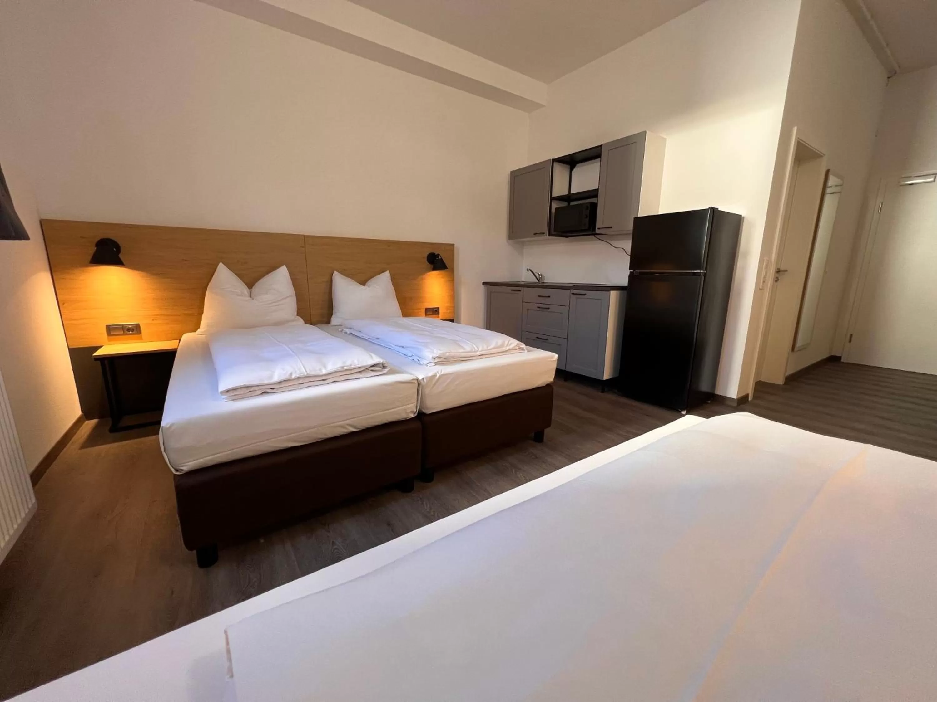 kitchen, Bed in Apartimo Altdorf