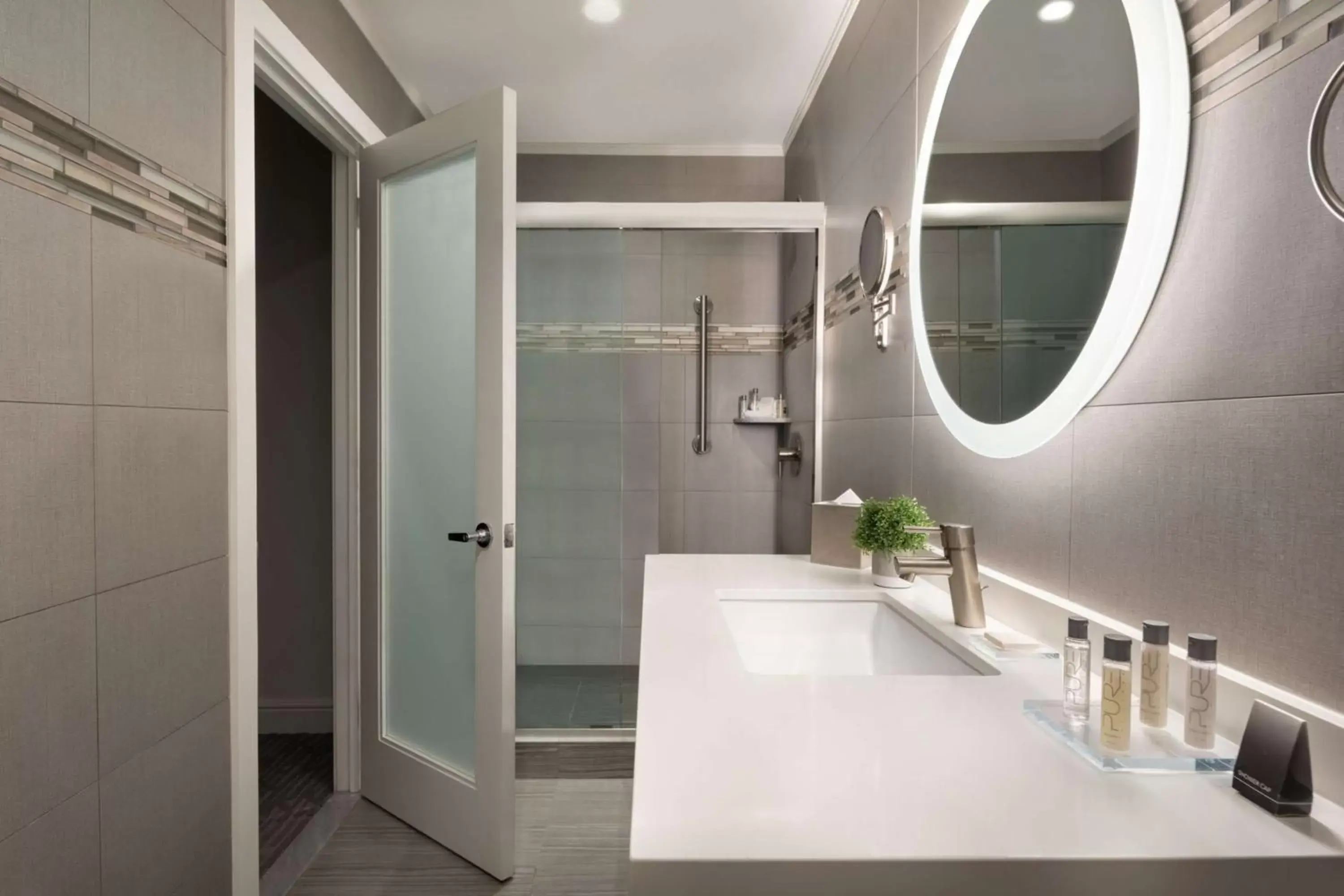 Bathroom in Martinique New York on Broadway, Curio Collection by Hilton