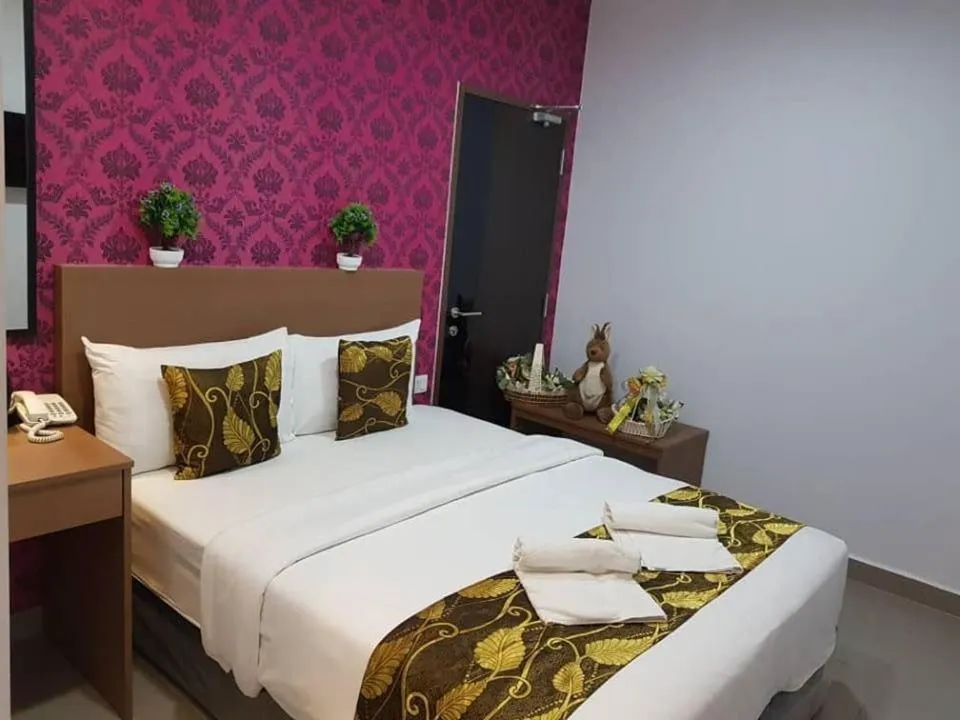 Bed in D'Metro Hotel