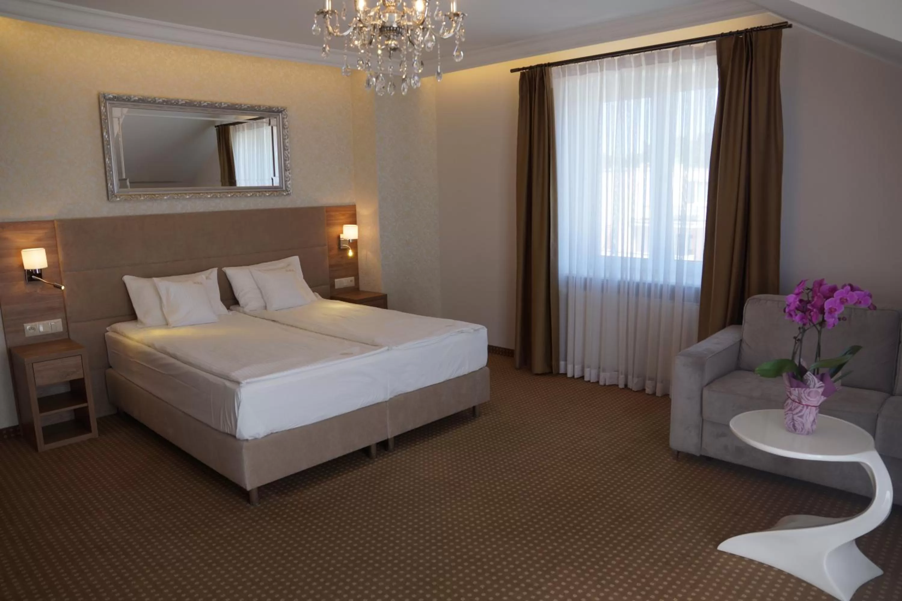 Bed in Moris Boutique Beach Hotel