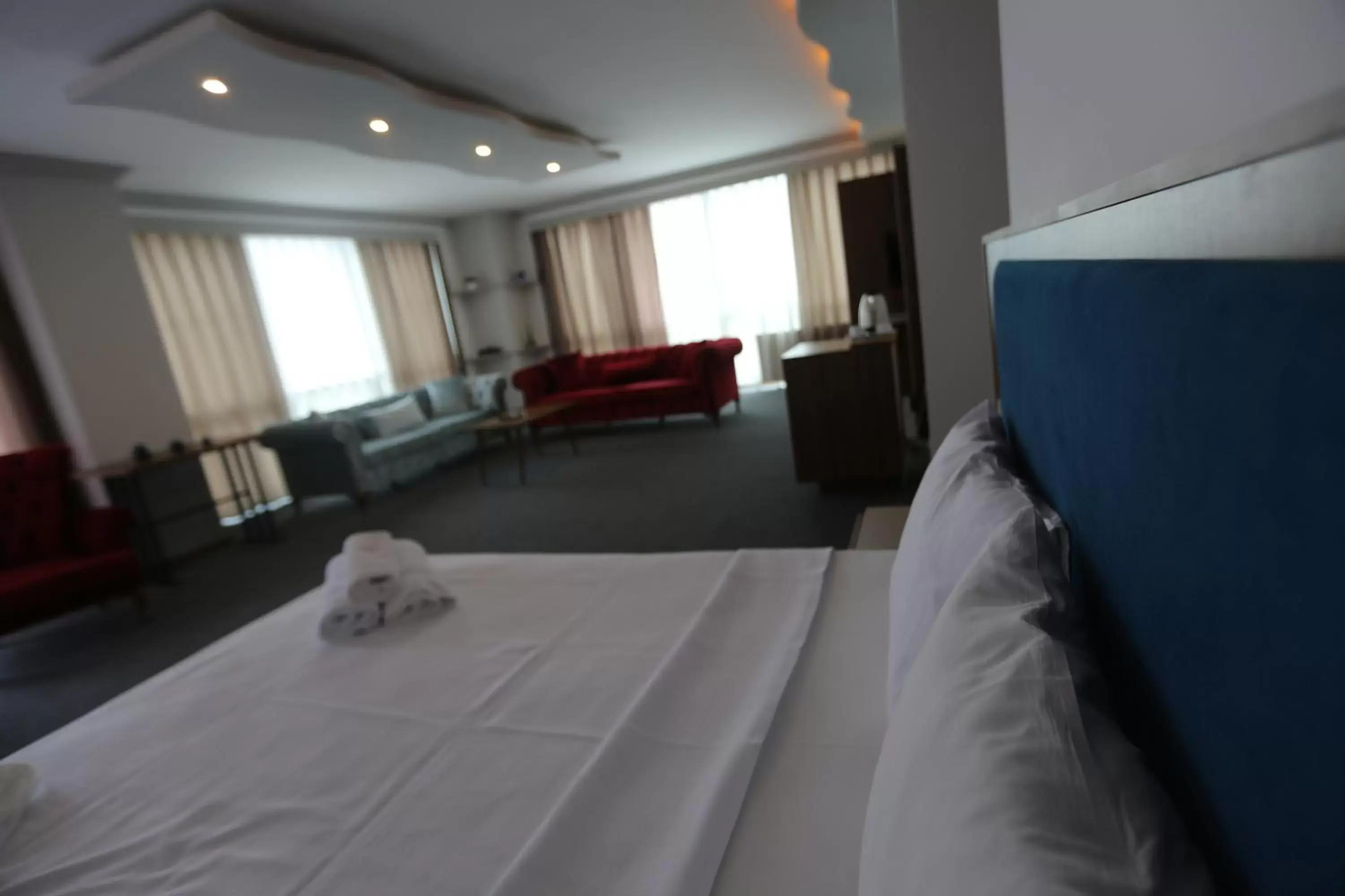 Bed in TEVETOGLU HOTEL