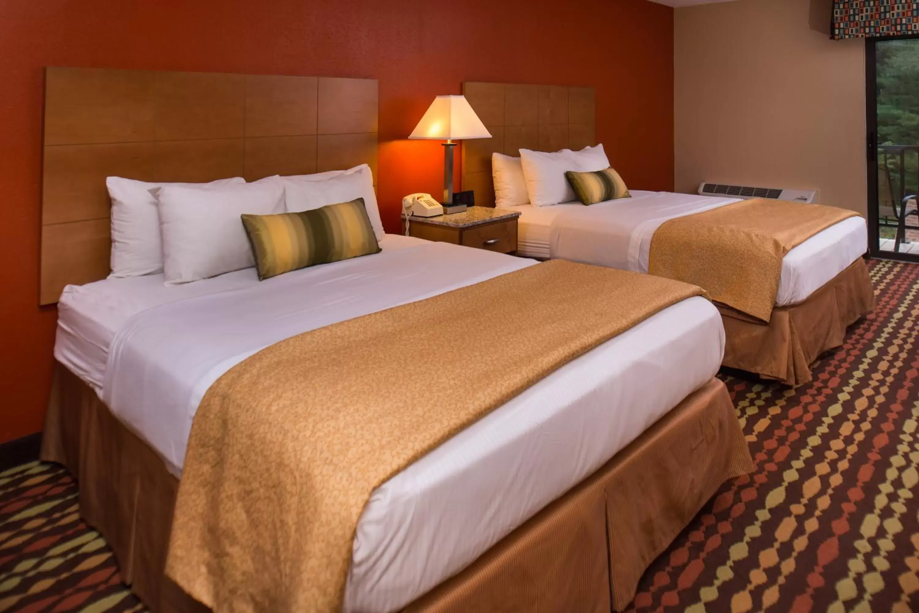 Queen Room with Two Queen Beds in Best Western Ambassador Inn & Suites