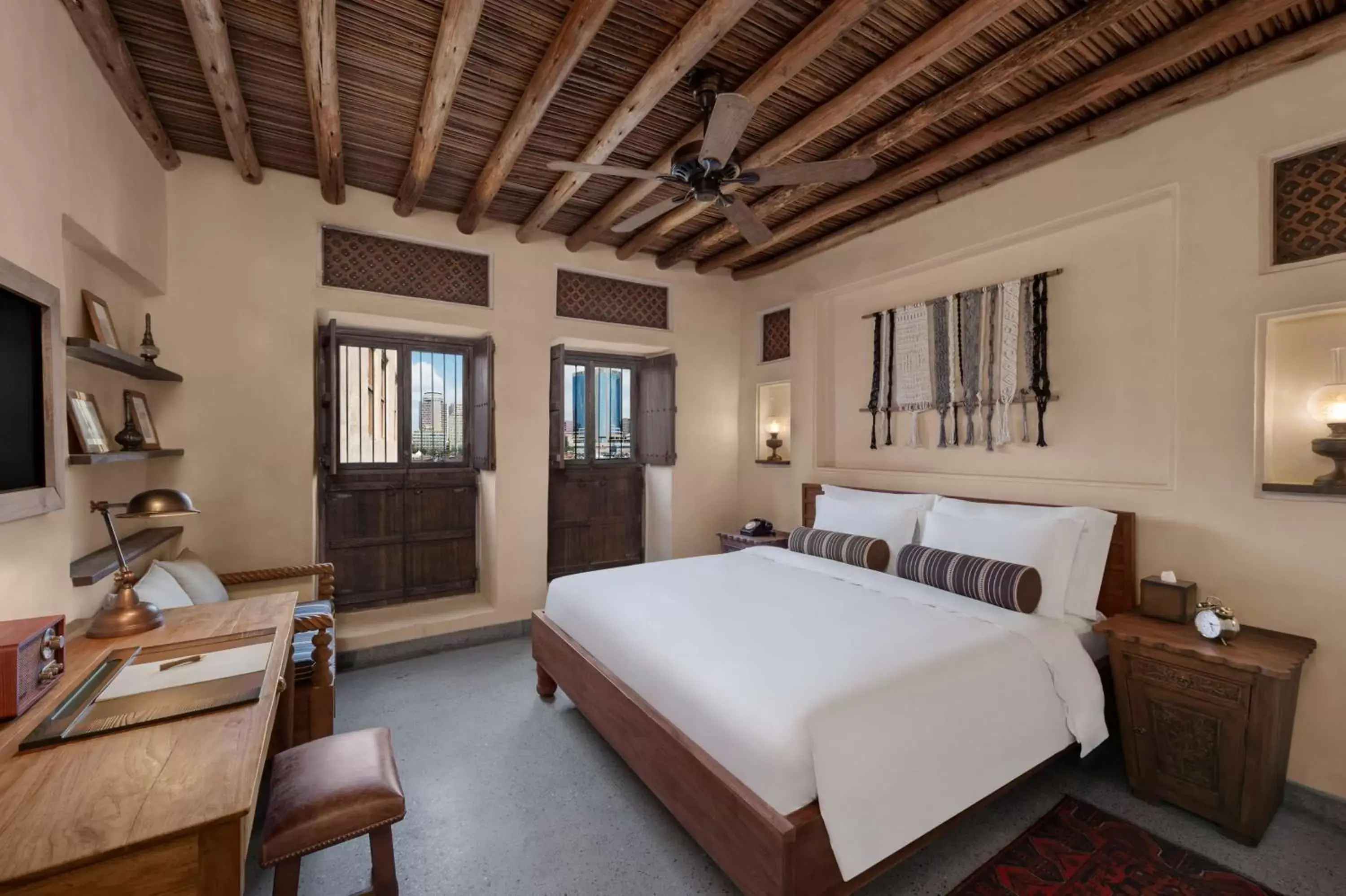 Bed in Al Seef Heritage Hotel Dubai, Curio Collection by Hilton