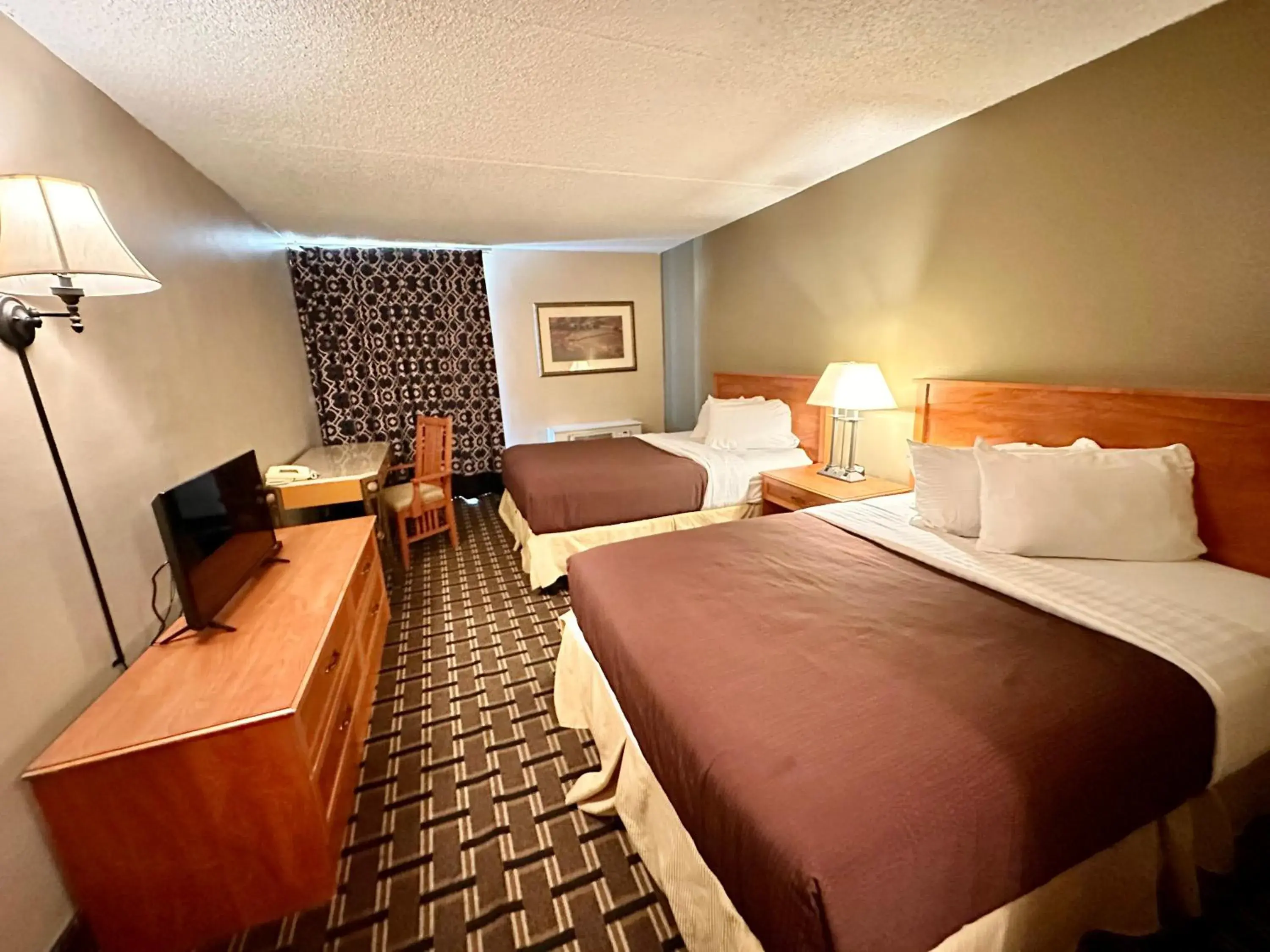 Bedroom in FairBridge Inn & Suites - Lewiston