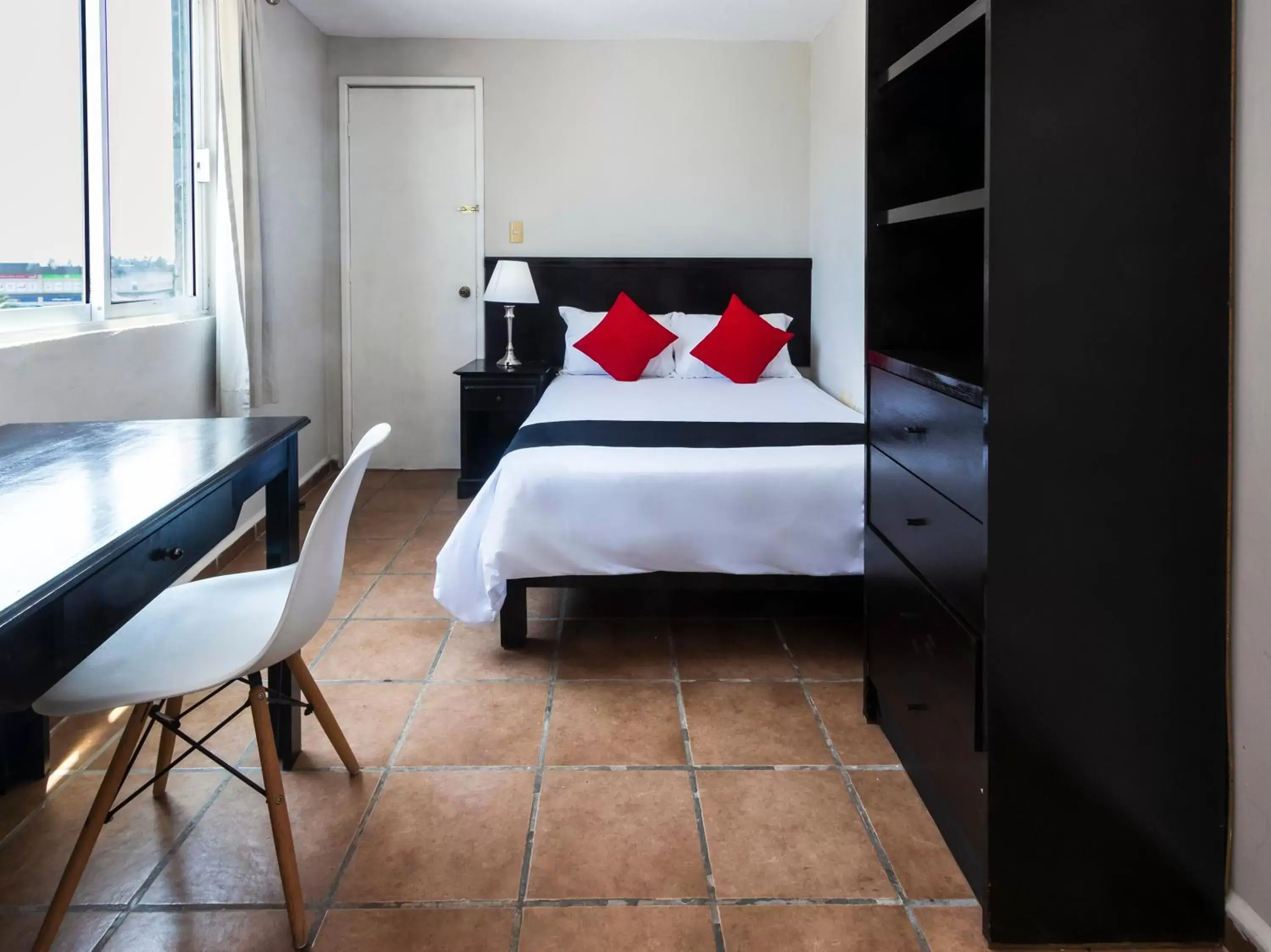 Bed in Boca Inn Hotel & Suites
