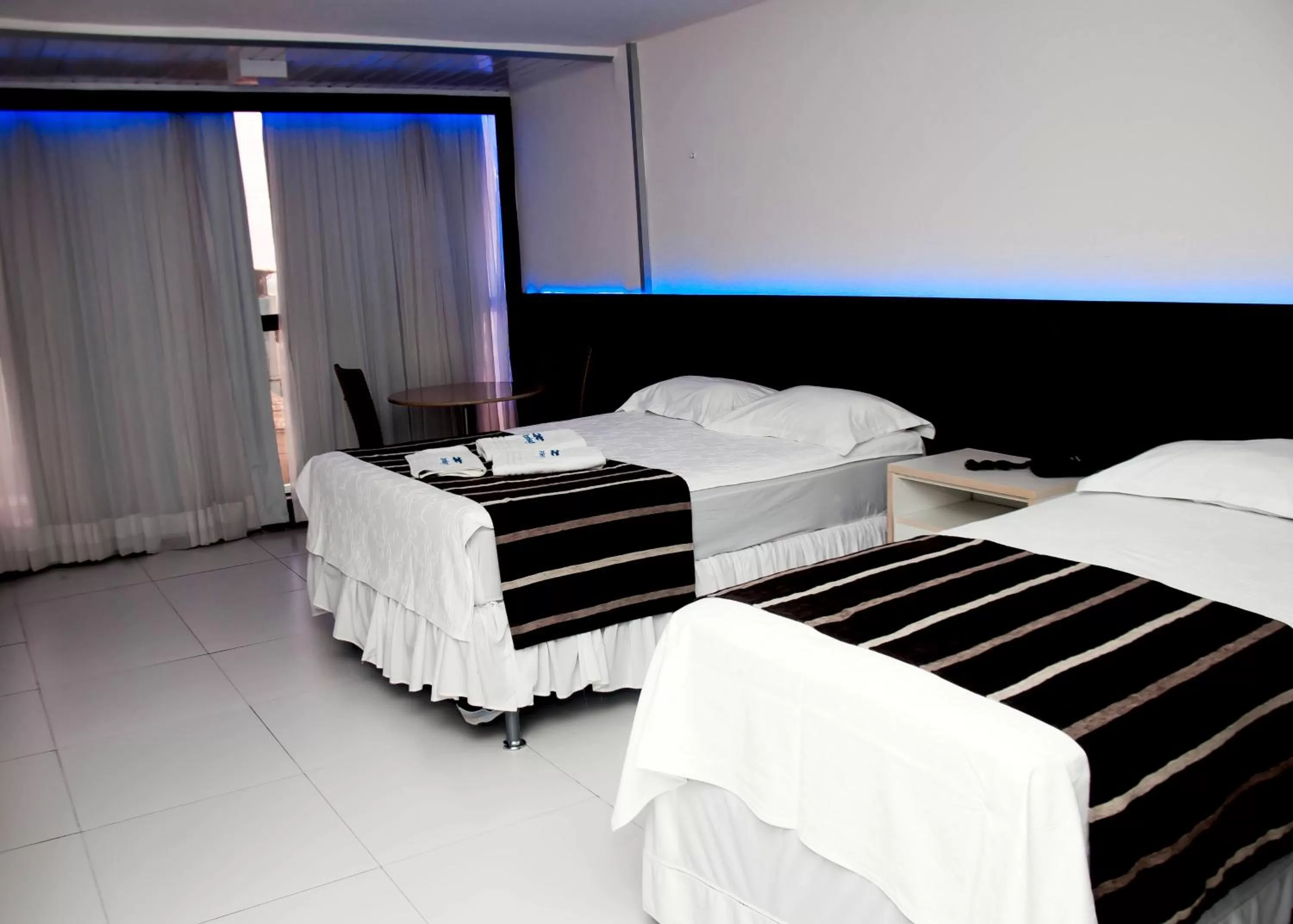 Bed, Room Photo in Tirol Praia Hotel