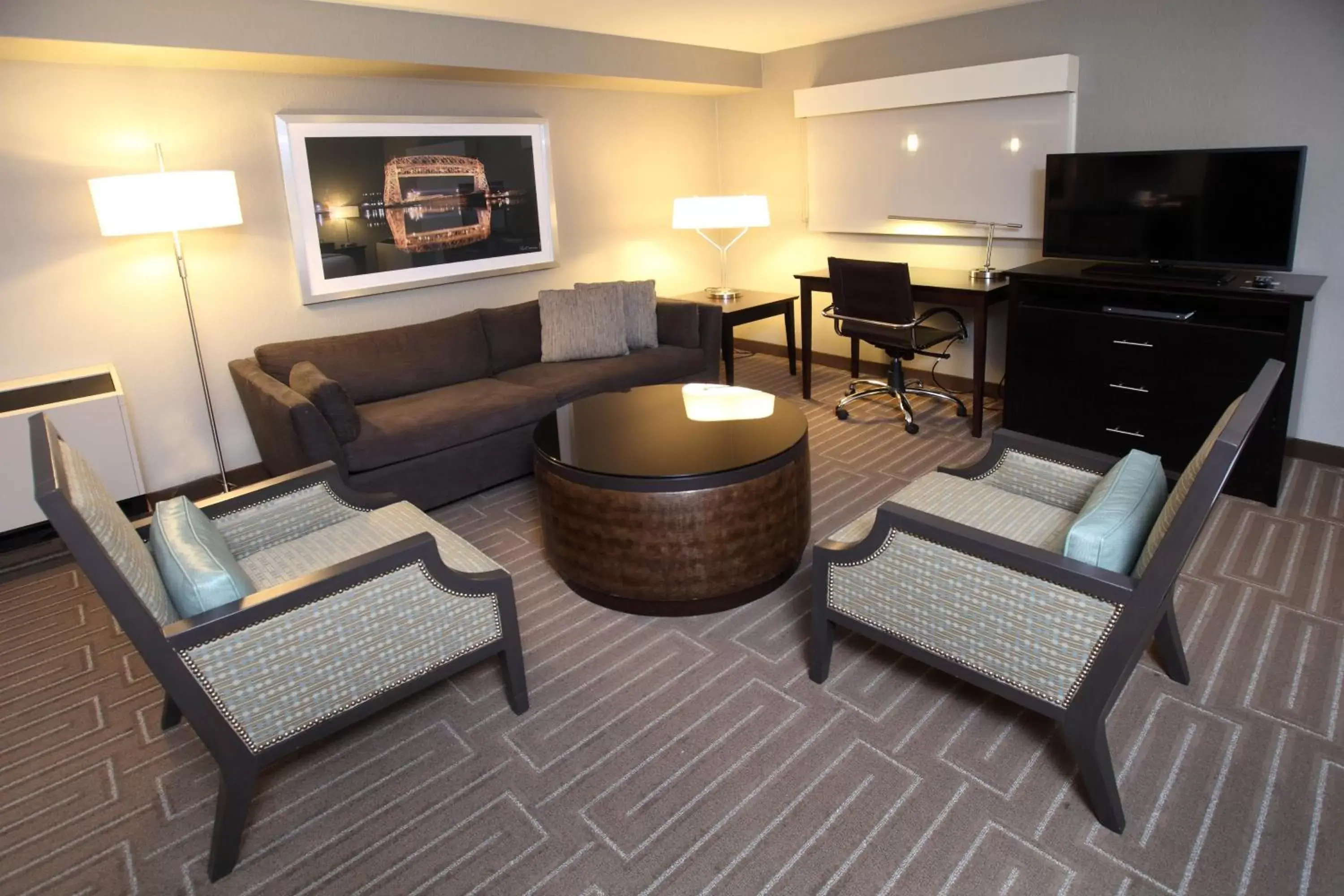 Bedroom, Seating Area in Holiday Inn & Suites Duluth-Downtown, an IHG Hotel
