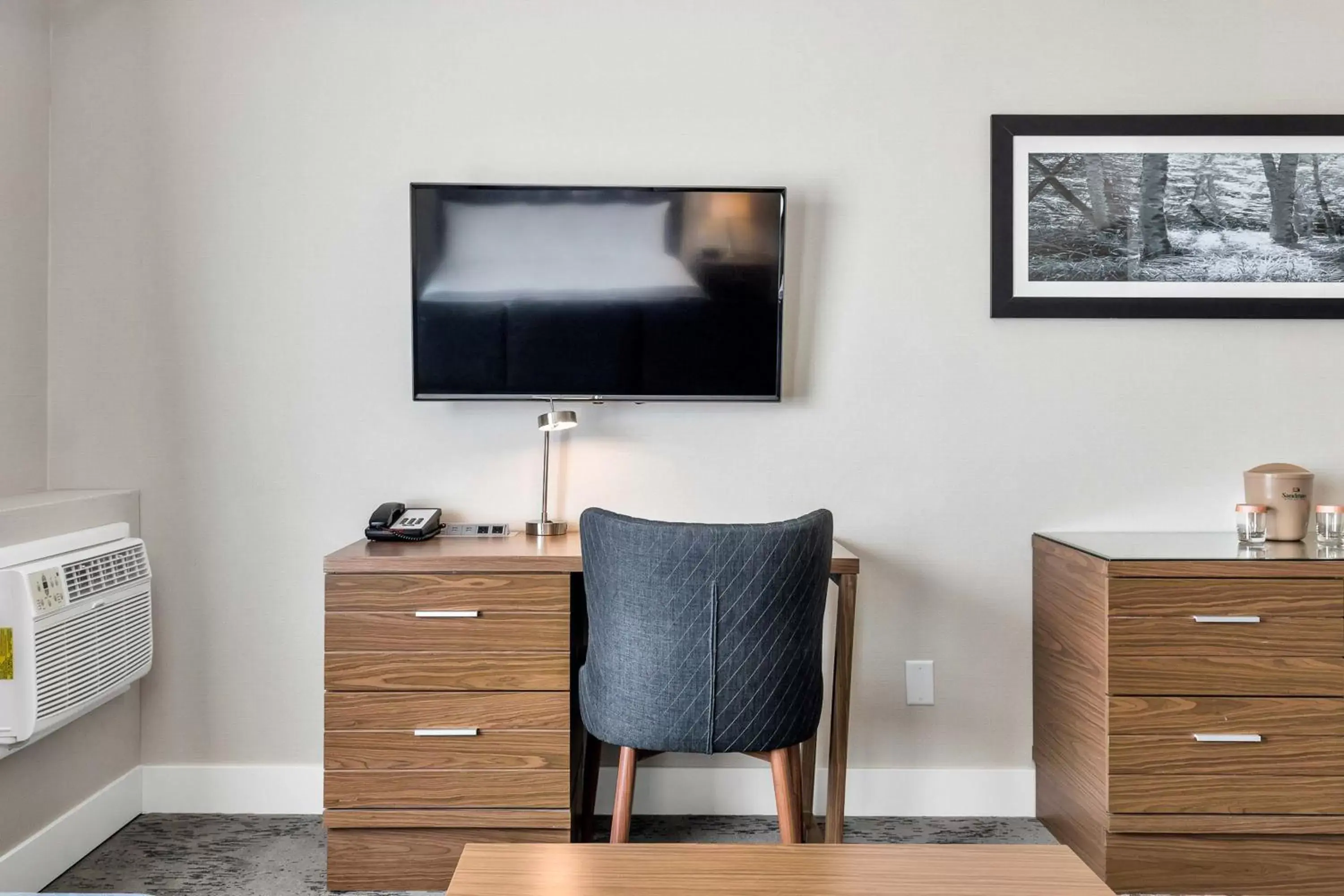 Photo of the whole room, TV/Entertainment Center in Sandman Hotel Grande Prairie