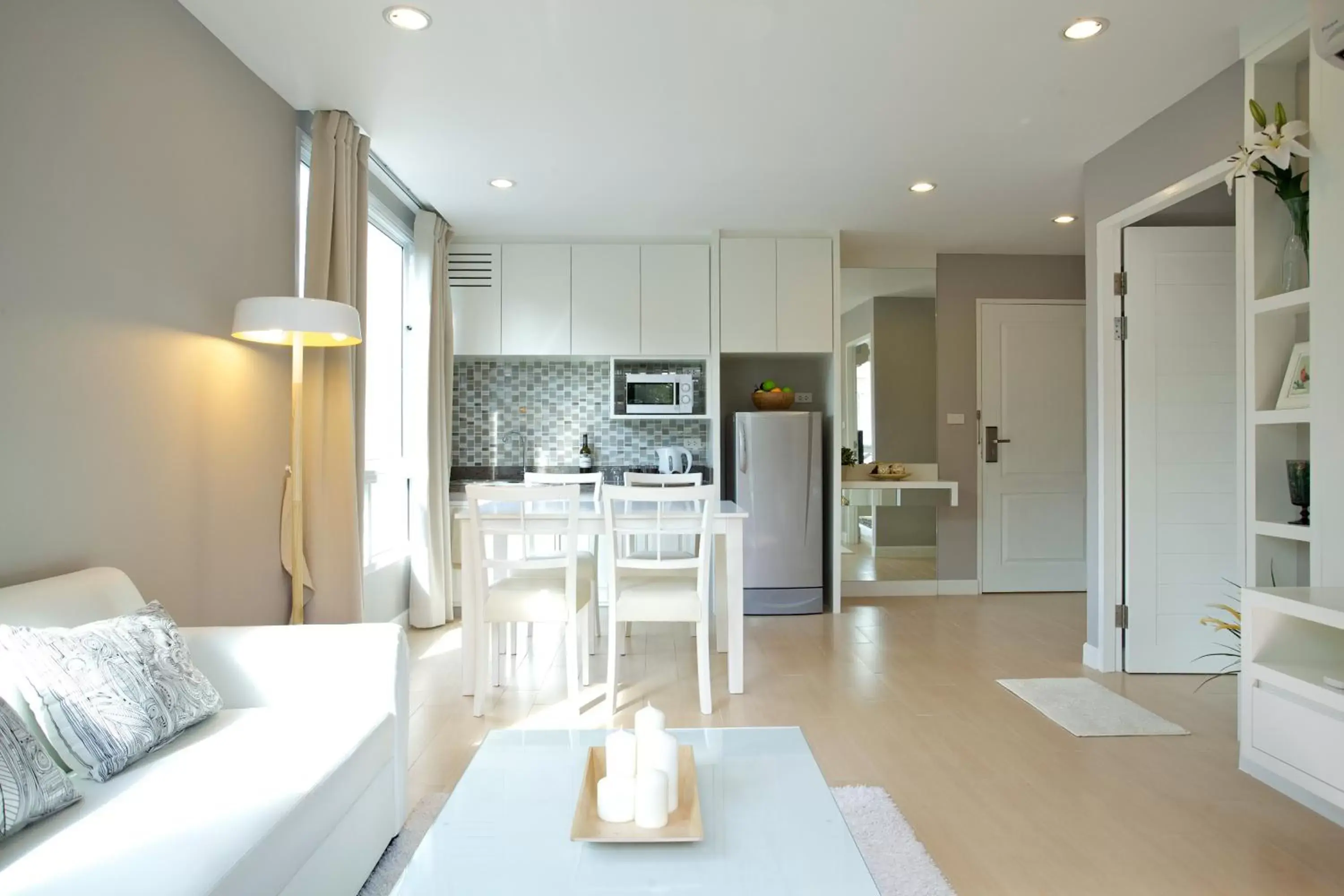 Living room, Kitchen/Kitchenette in Cinnamon Residence SHA Plus
