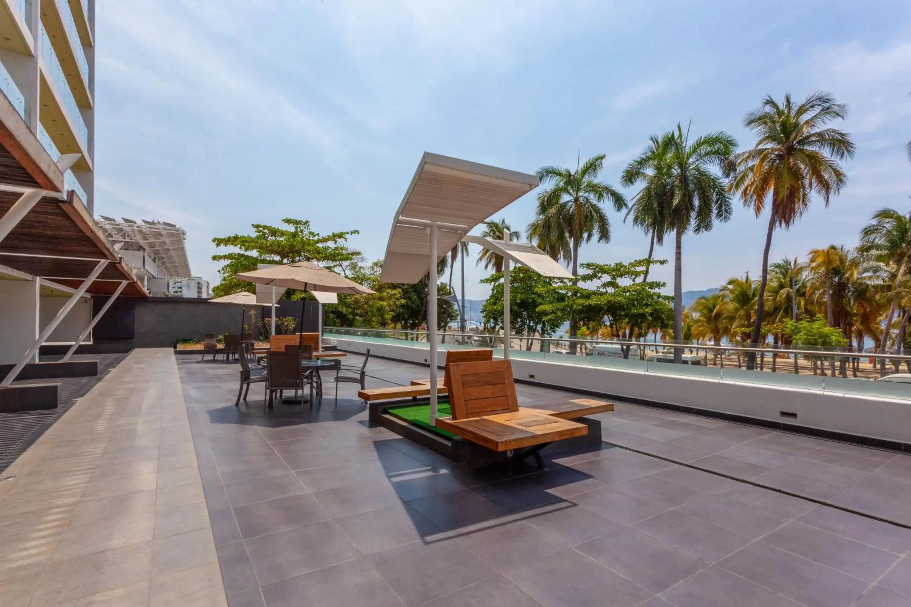 Patio in Ramada by Wyndham Acapulco Hotel & Suites