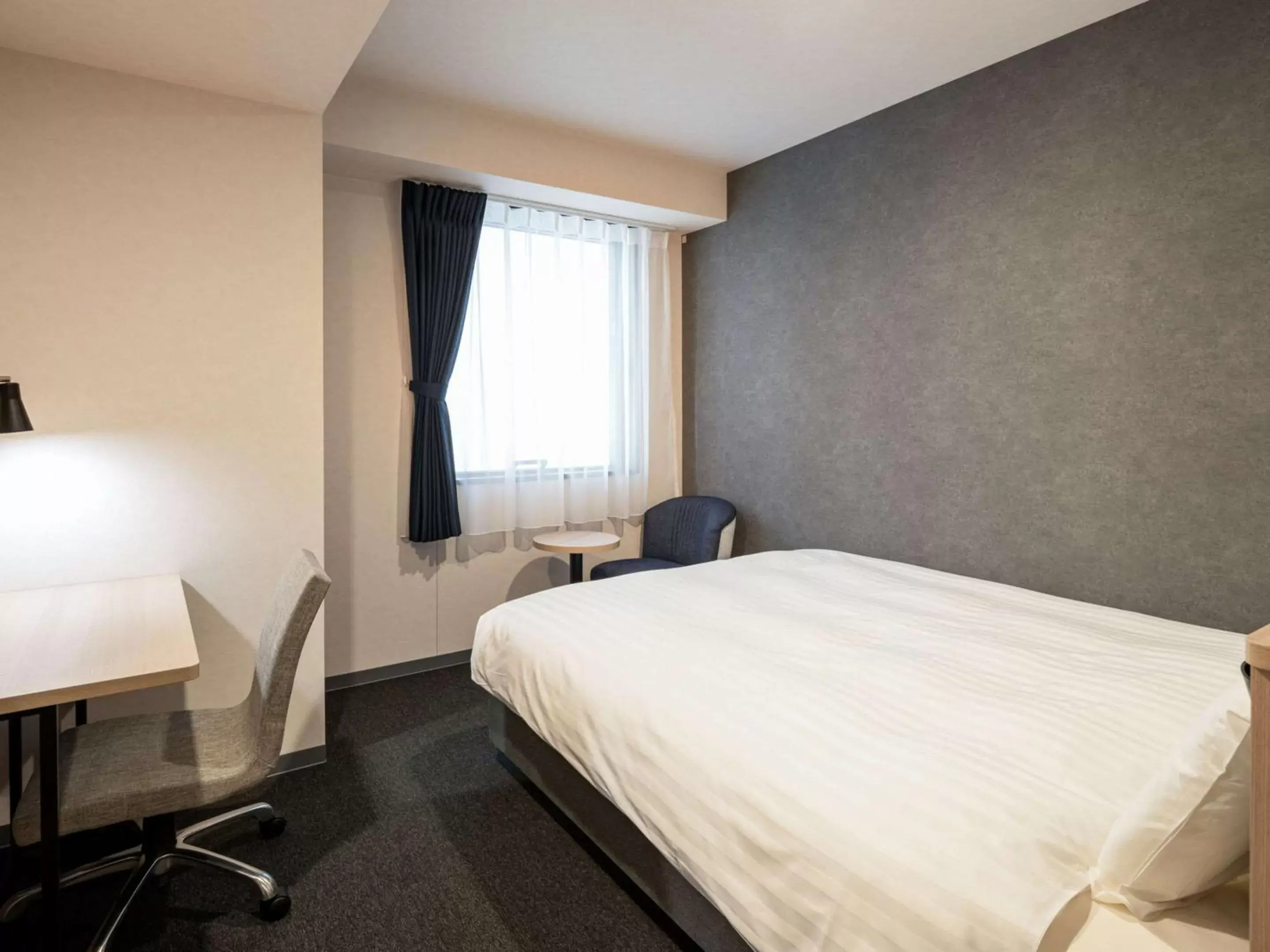 Photo of the whole room, Bed in Comfort Hotel Nagoya Meiekiminami