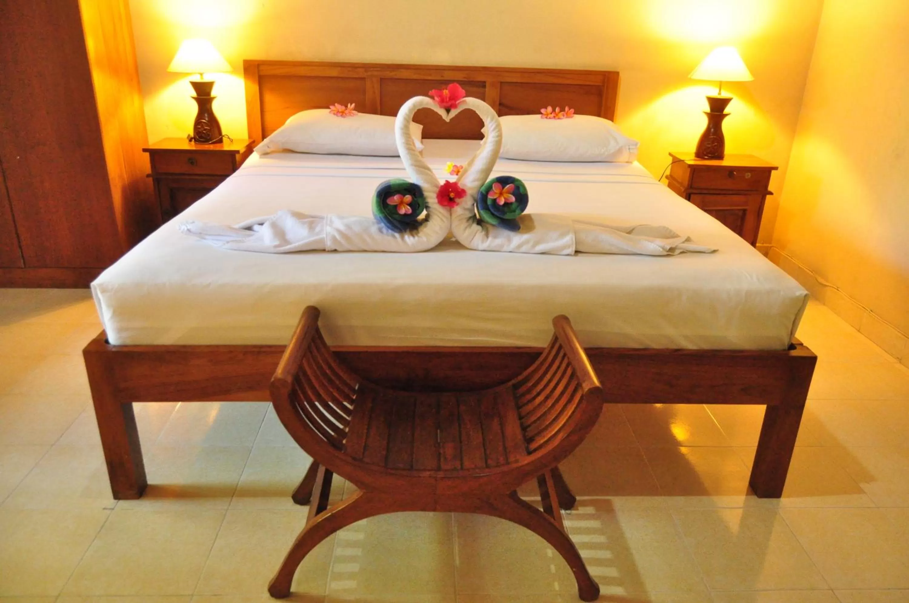 Bed in Kusnadi Hotel