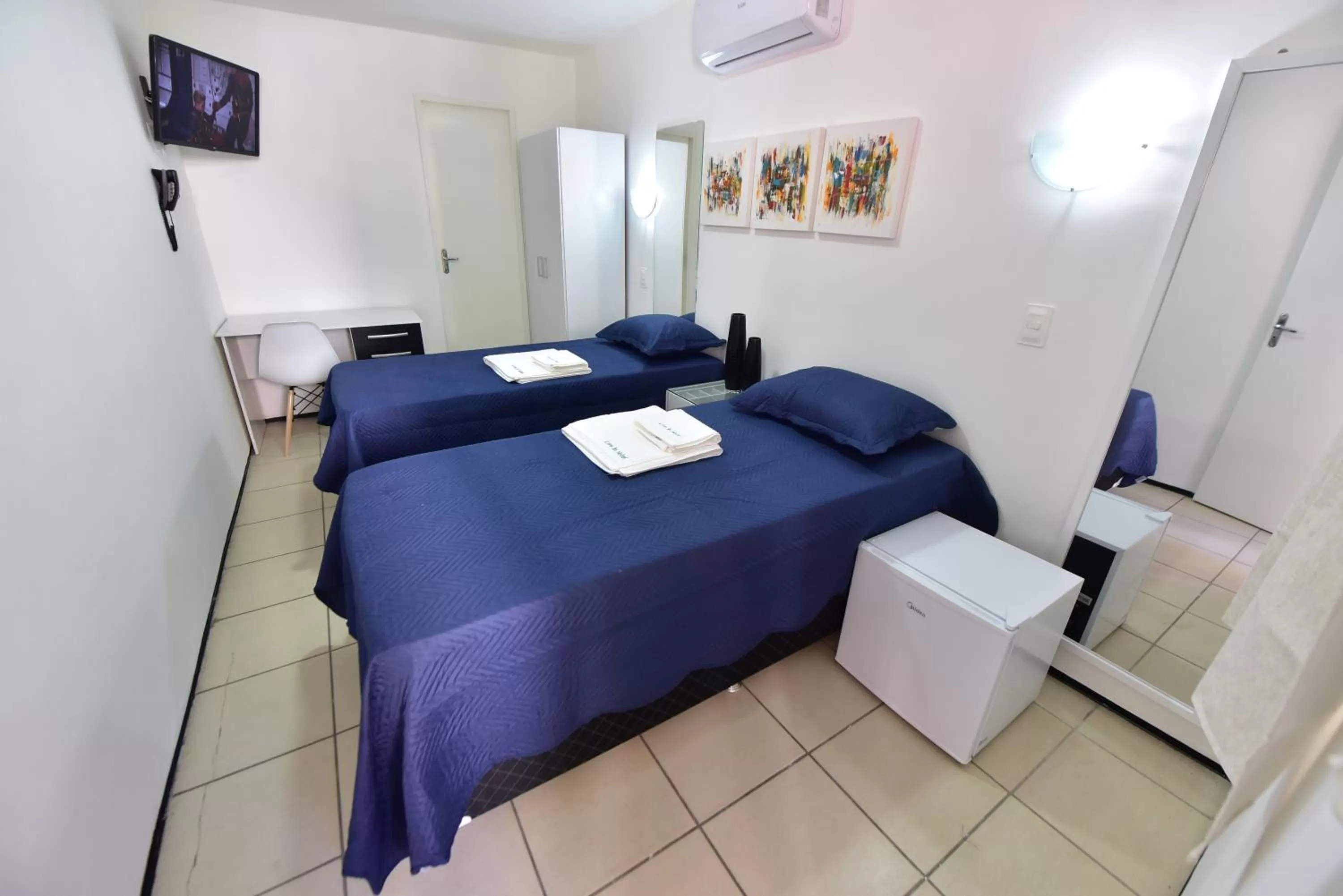 Bed in LIVE IN FORTALEZA HOTEL