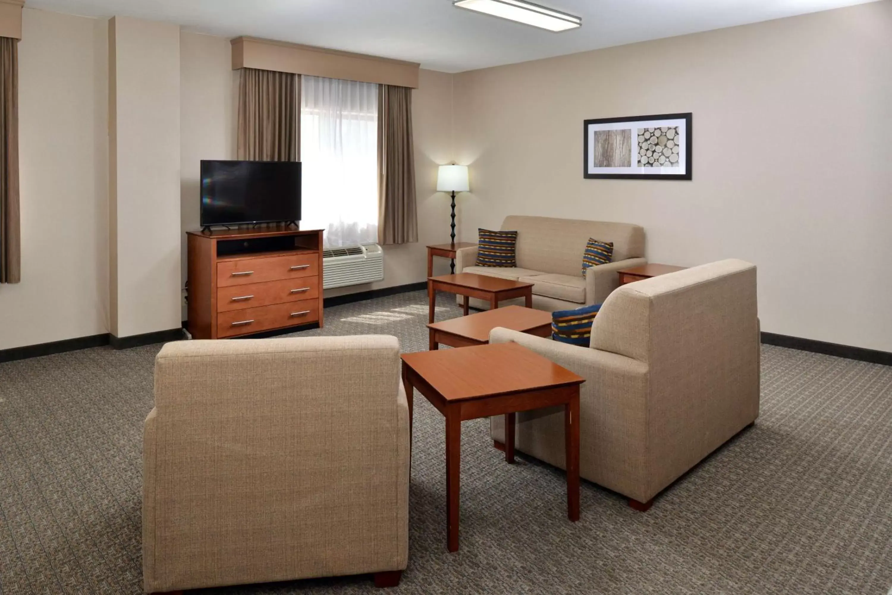 Bedroom, Seating Area in Best Western Big Spring Lodge