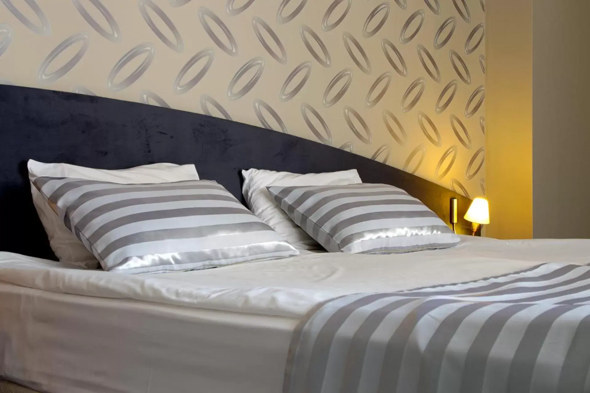 Bed in Triada Hotel