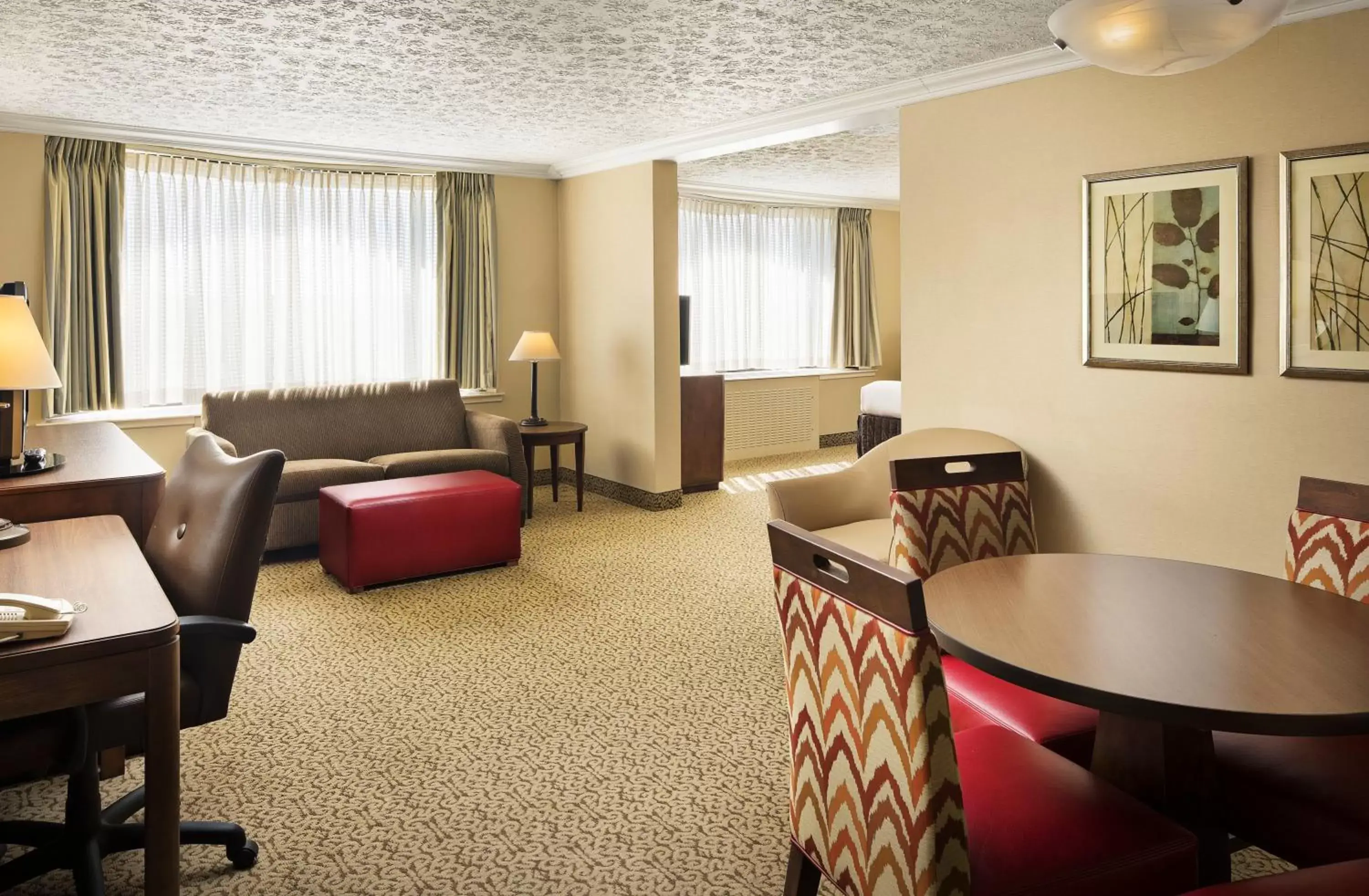 Photo of the whole room, Seating Area in Crowne Plaza Louisville Airport Expo Center, an IHG Hotel