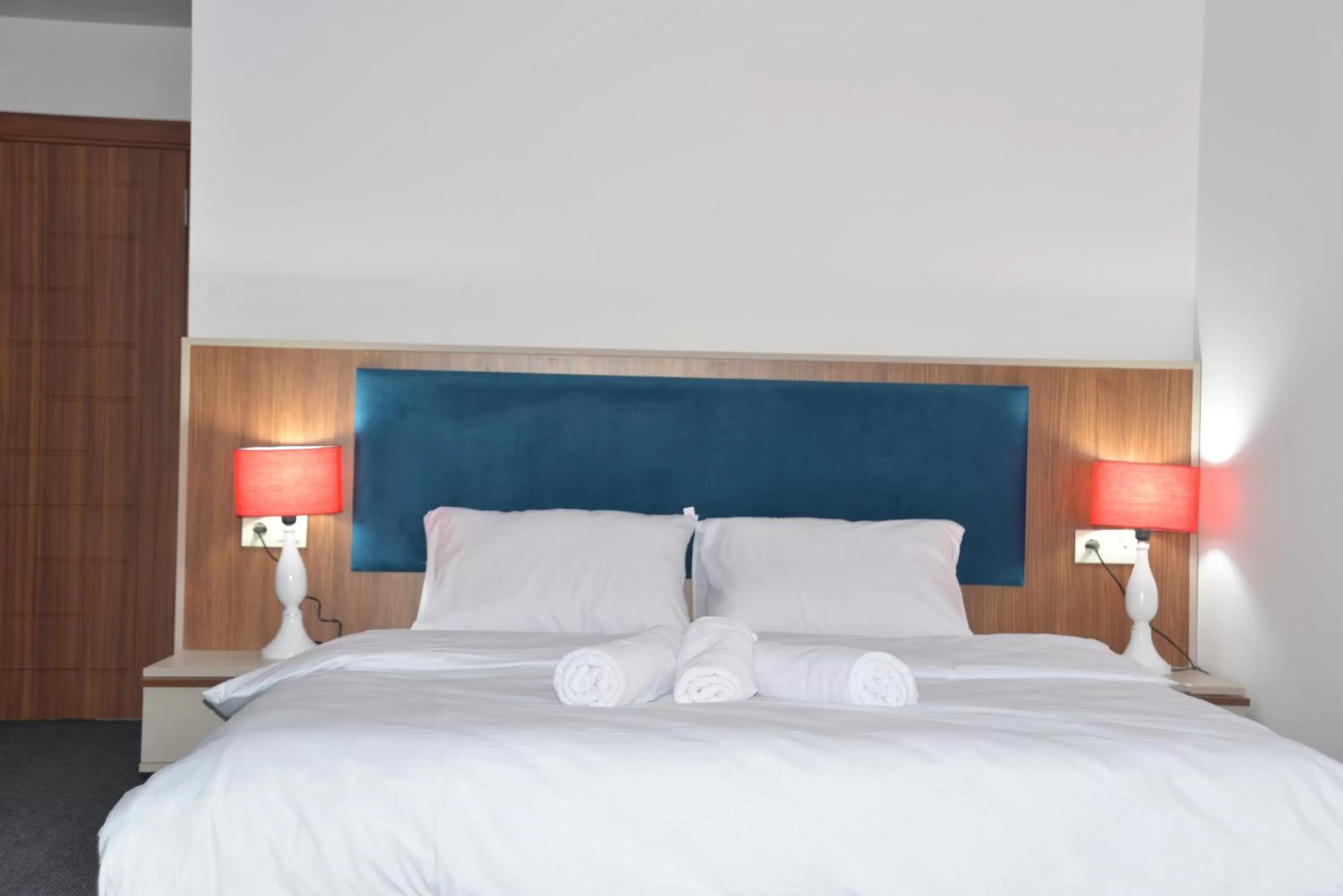 Bed in TEVETOGLU HOTEL