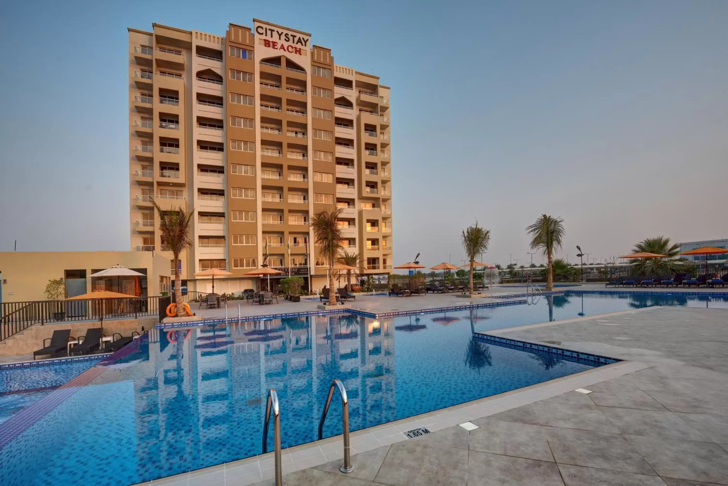 Property building, Swimming Pool in City Stay Beach Hotel Apartments - Marjan Island