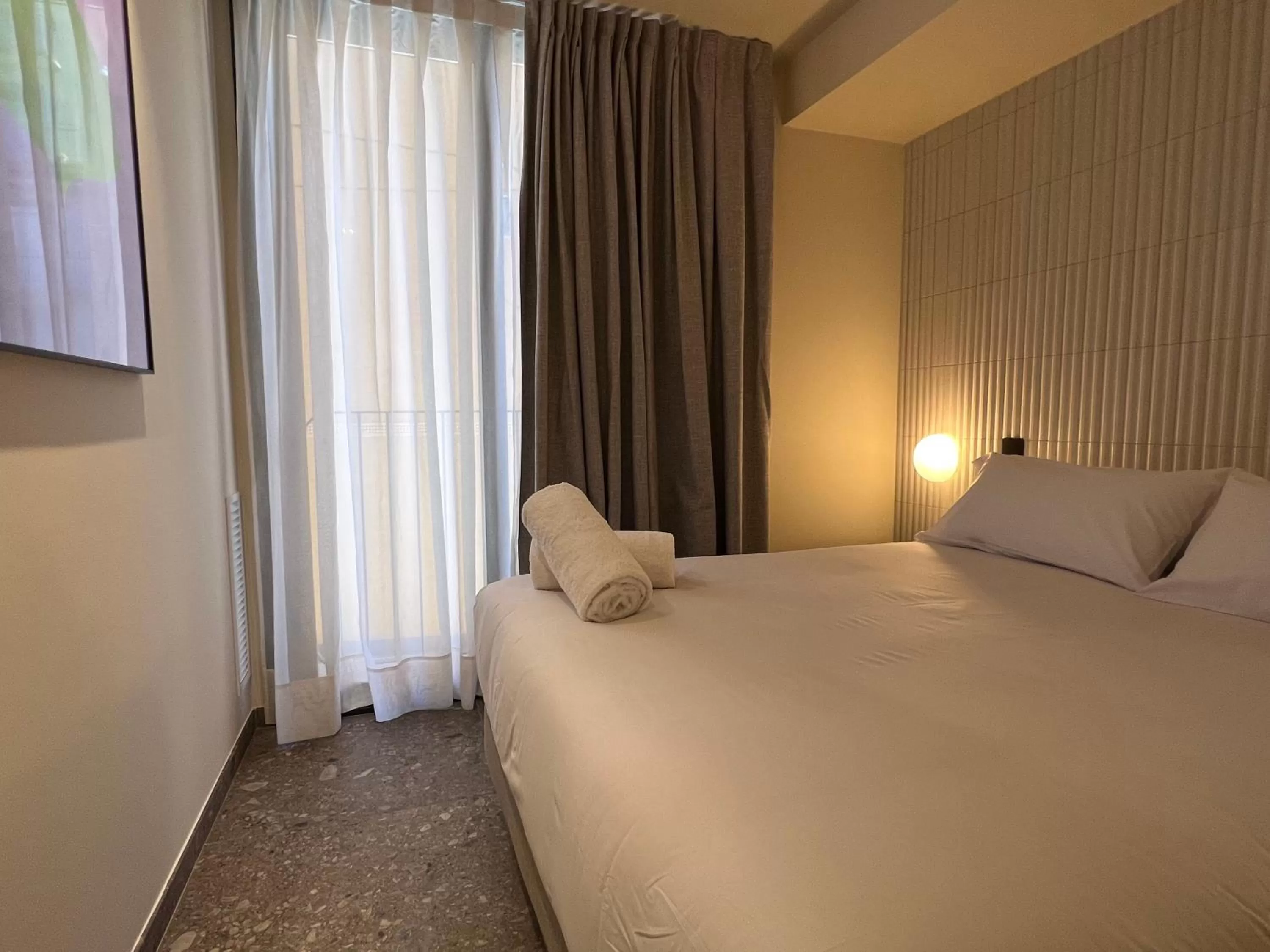 Bed in CIM HOTEL BOUTIQUE