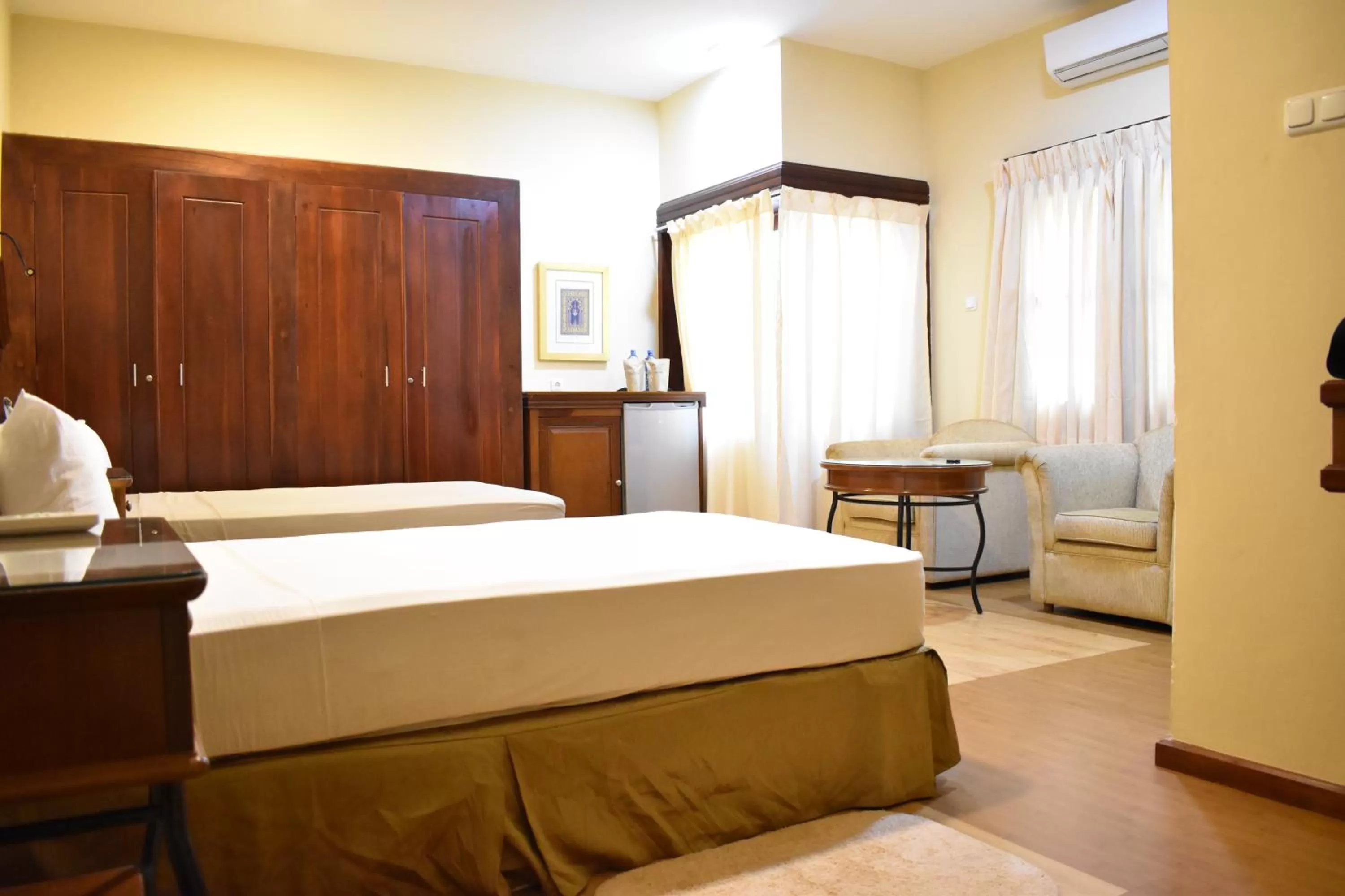 Bed in Hotel 4 U Saliya Garden