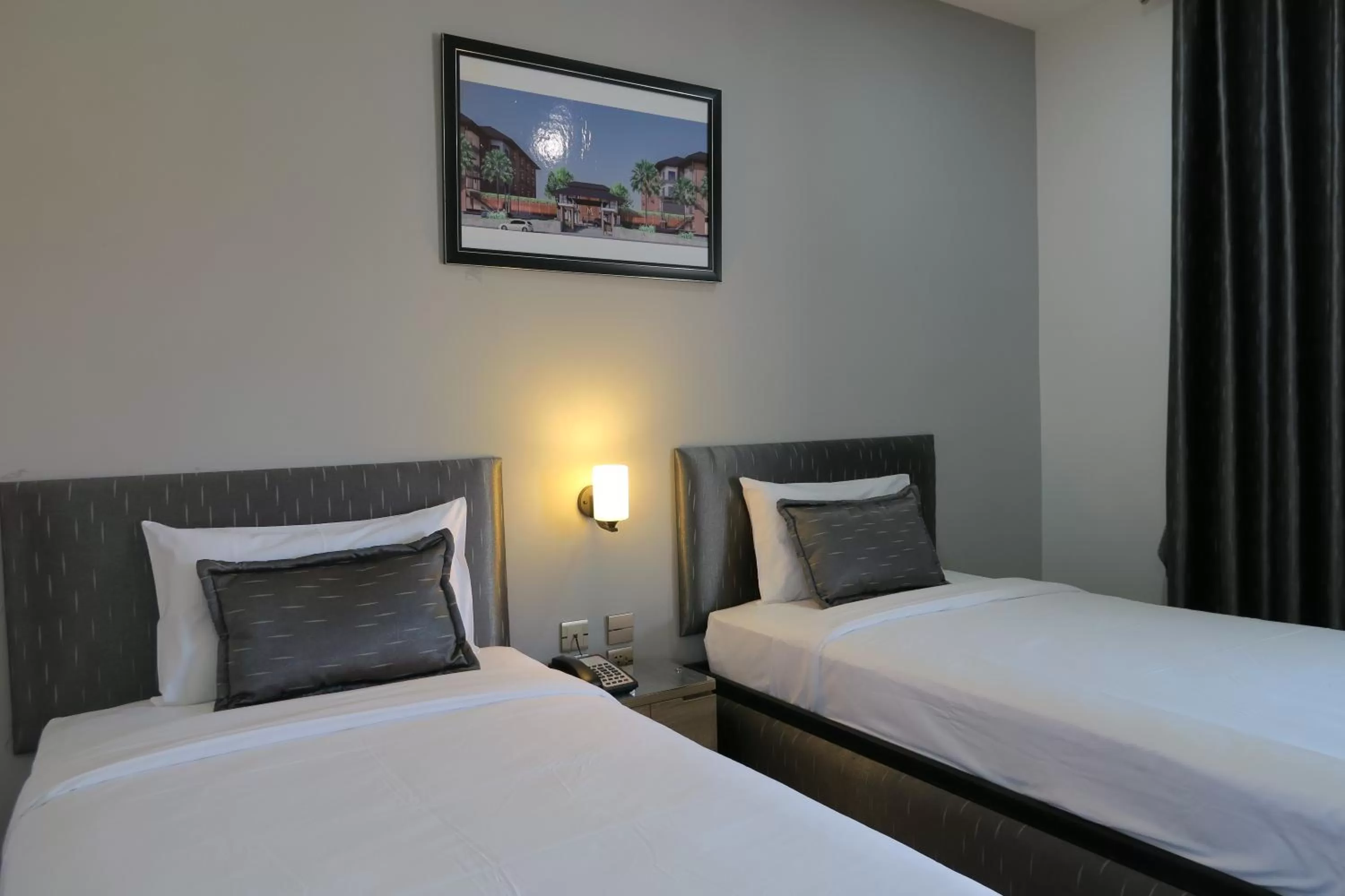 Bed in The Mira Hotel Chiang Rai