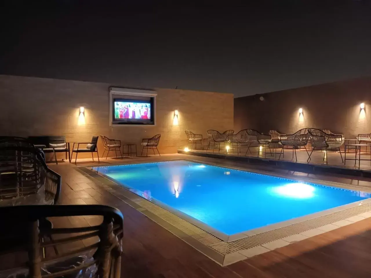 Night, Swimming Pool in Naviti Warwick Dammam