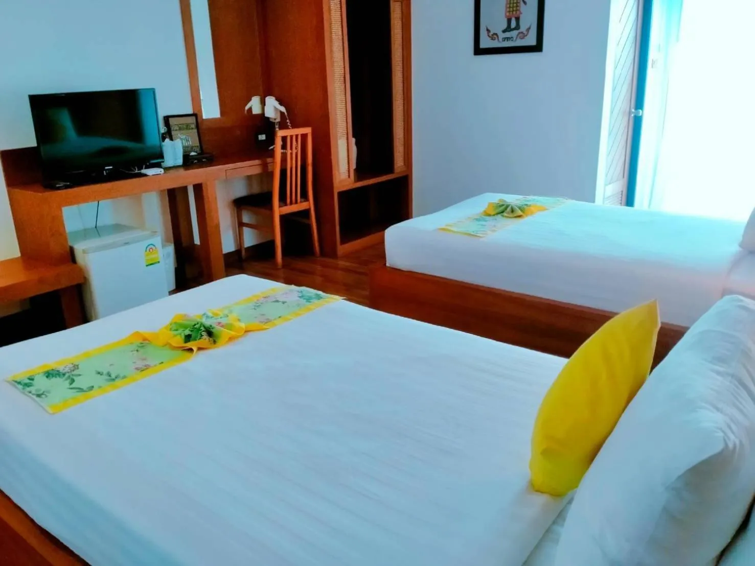 Bed in Jingjit Hotel