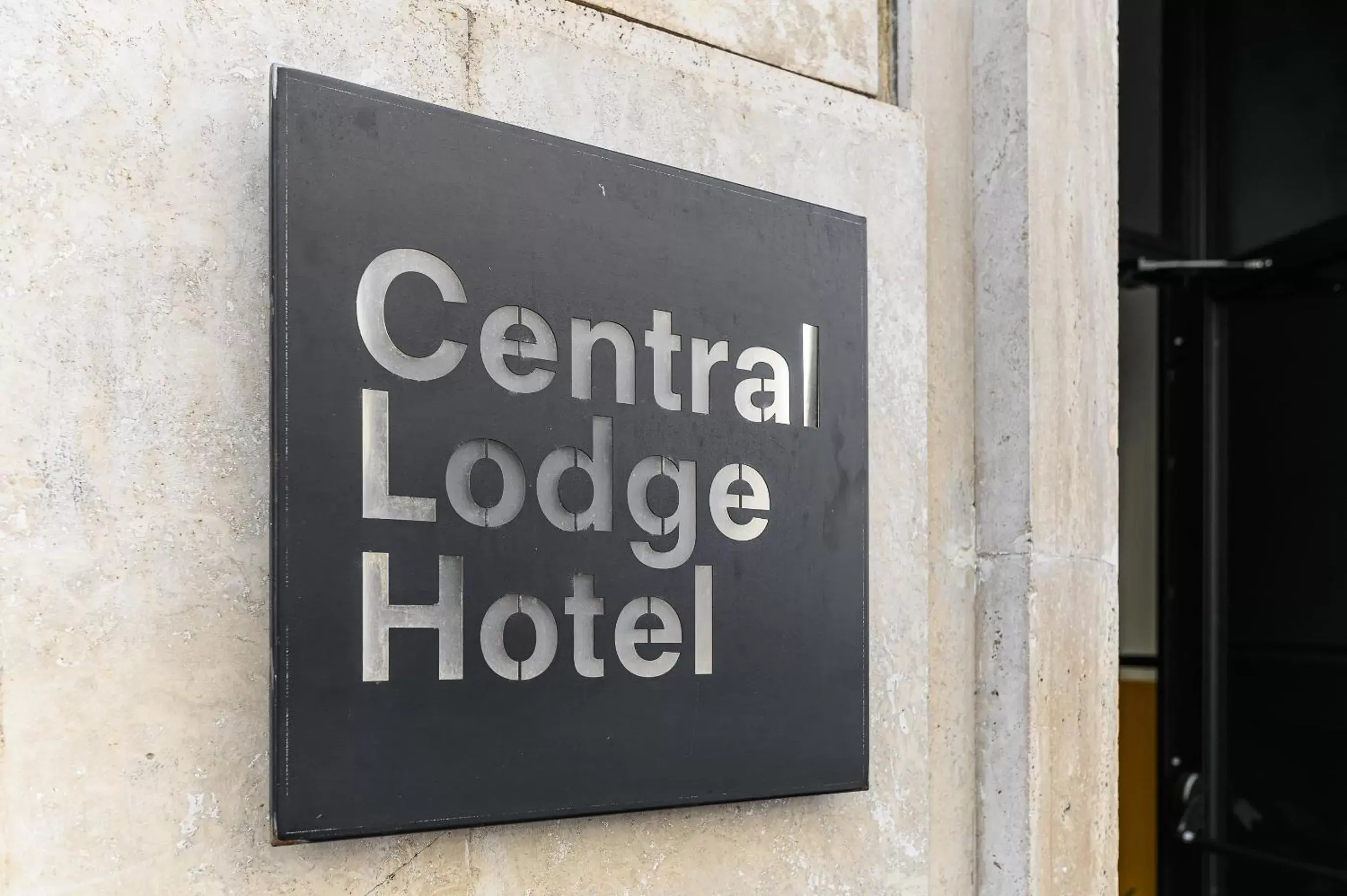 Property logo or sign in Central Lodge Hotel