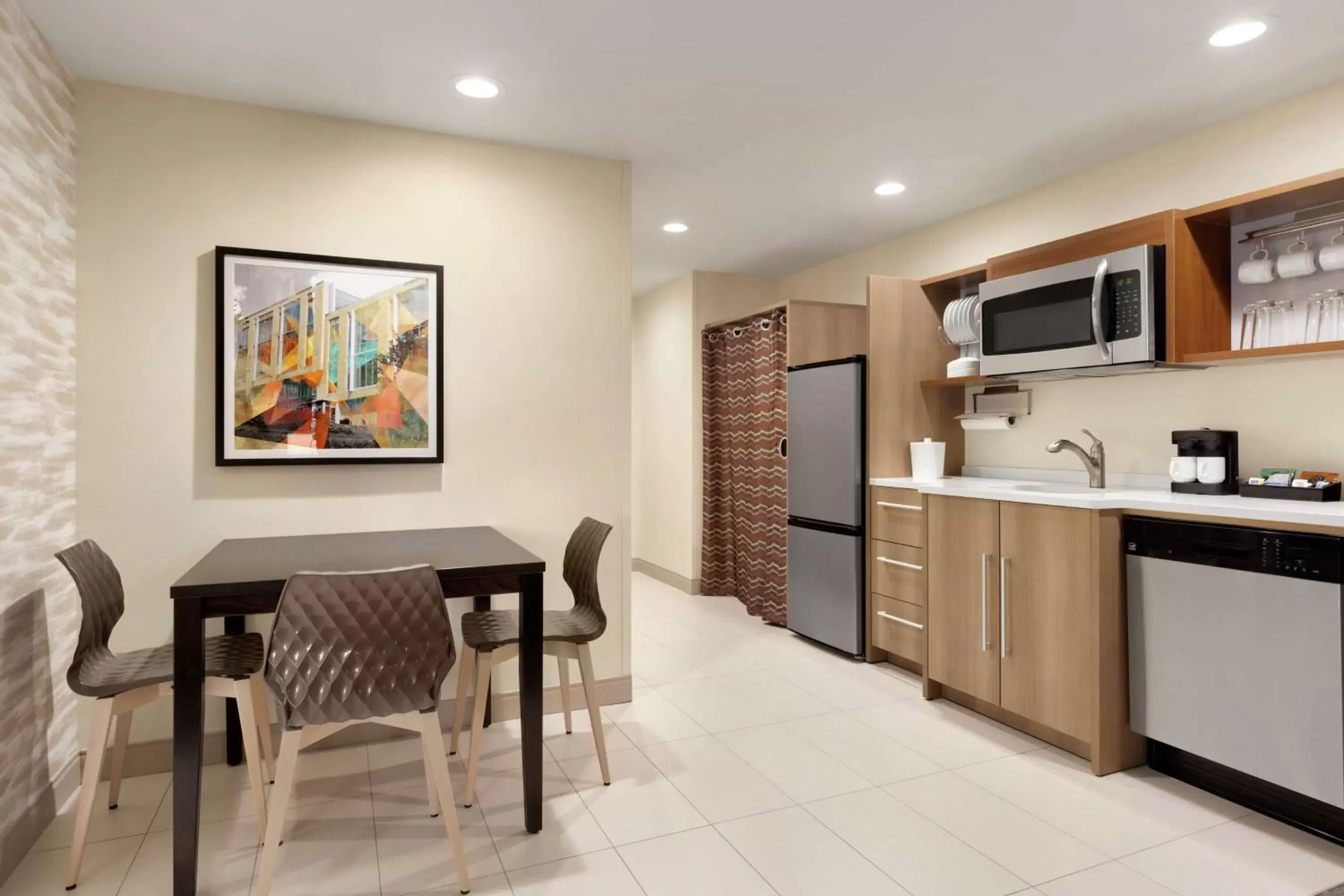 Bedroom, Kitchen/Kitchenette in Home2 Suites by Hilton New Brunswick, NJ