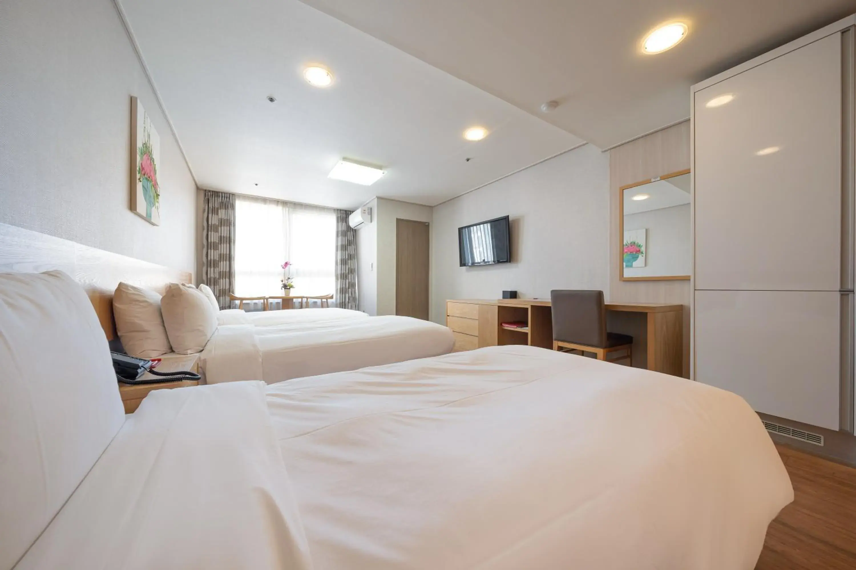 Bed in Ramada by Wyndham Seoul Dongdaemun