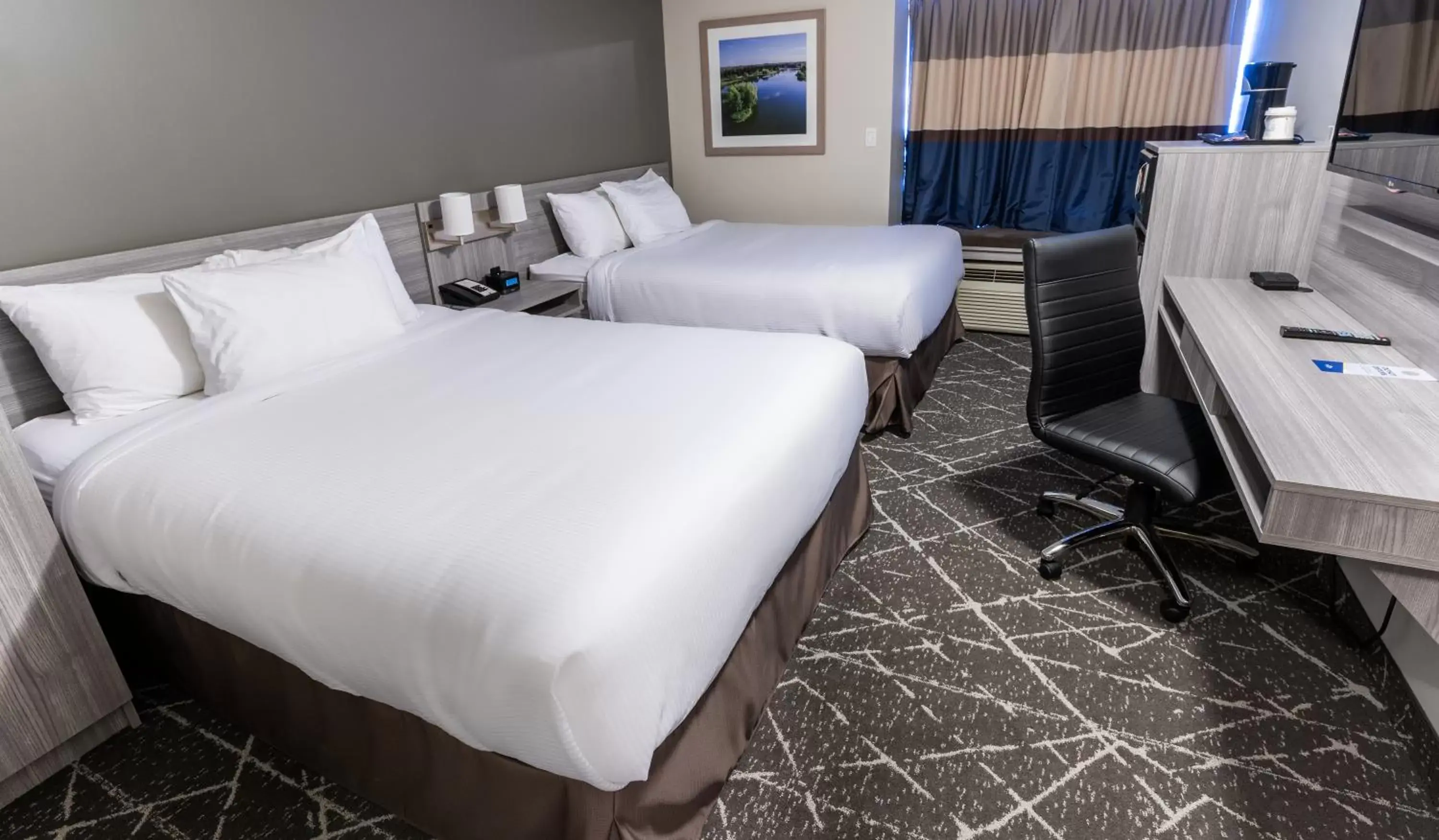 Bed in Microtel Inn & Suites by Wyndham Lloydminster