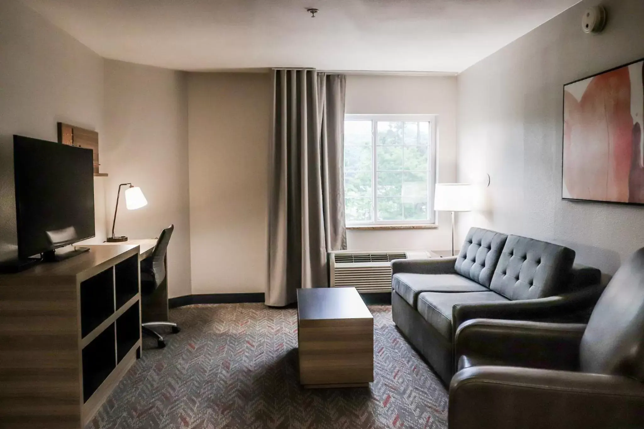 Bedroom, Seating Area in Candlewood Suites Richmond Airport, an IHG Hotel