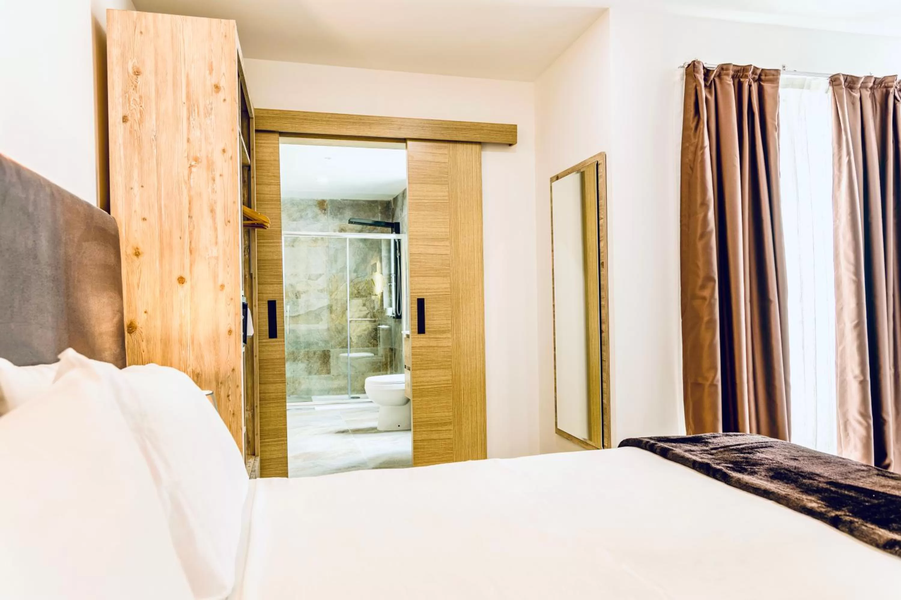 Bed in The Mike Hotel by CX Collection