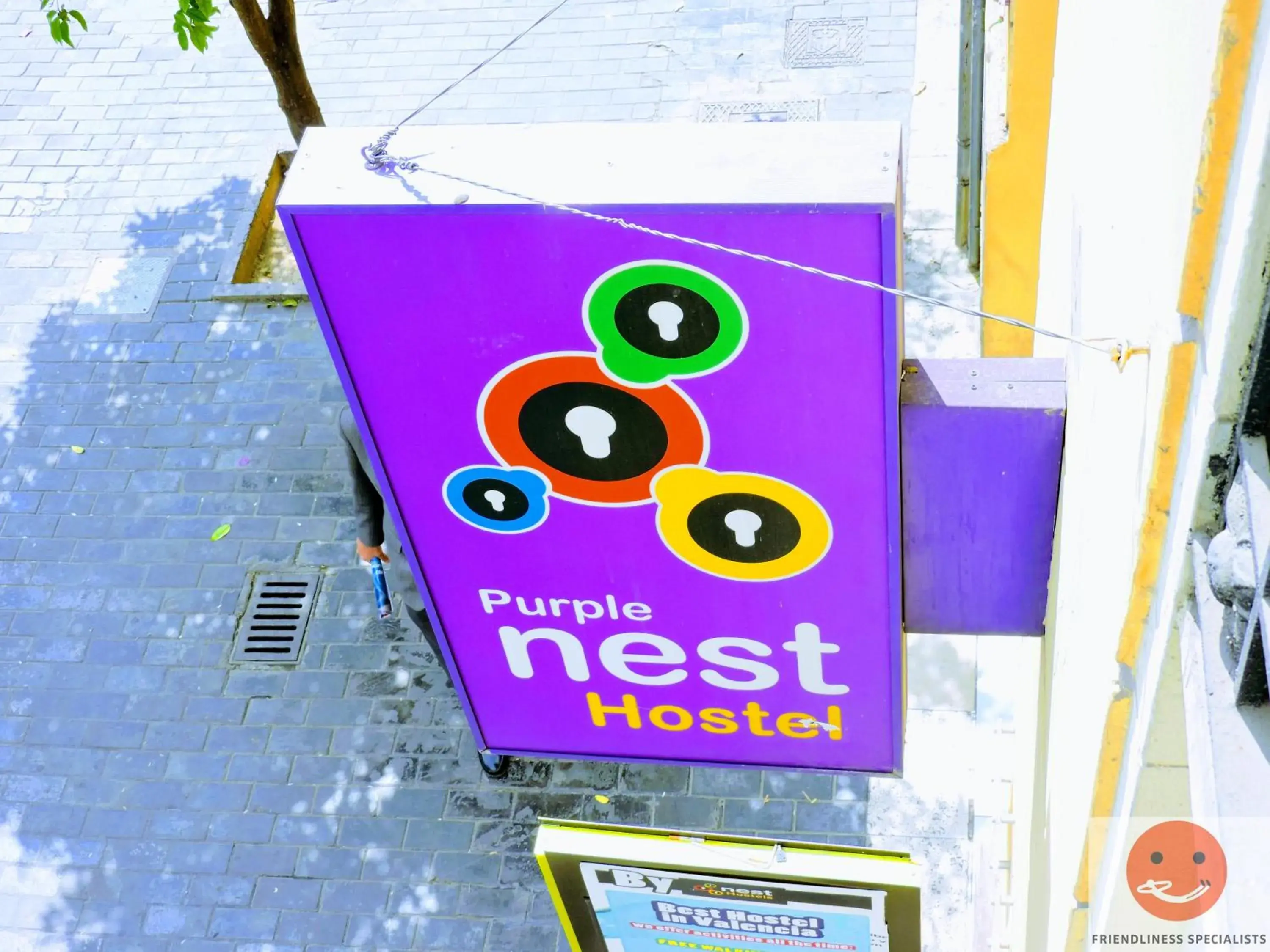 Property logo or sign in Purple Nest Hostel