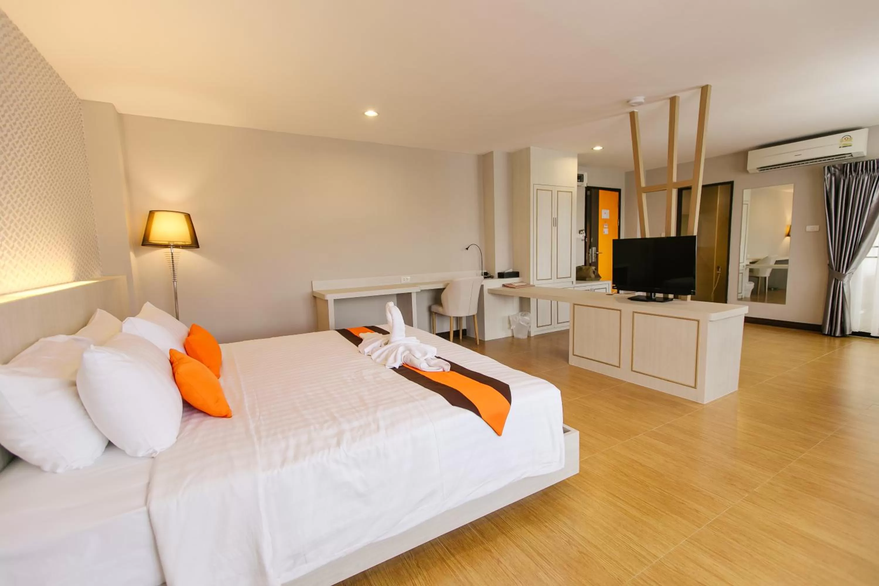 Bed in De Hug Hotel & Residence