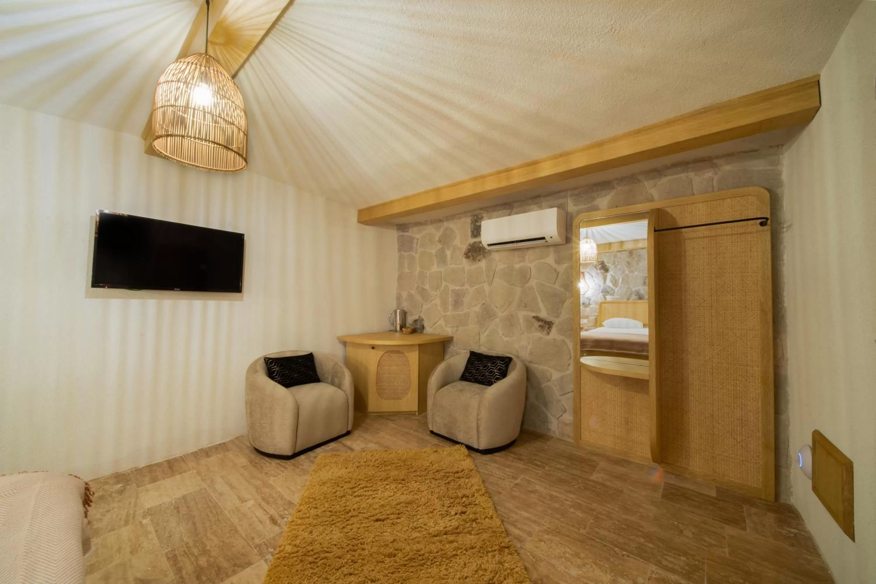 Seating area, Bed in Cappadocia Naif Hotel - Adults Only