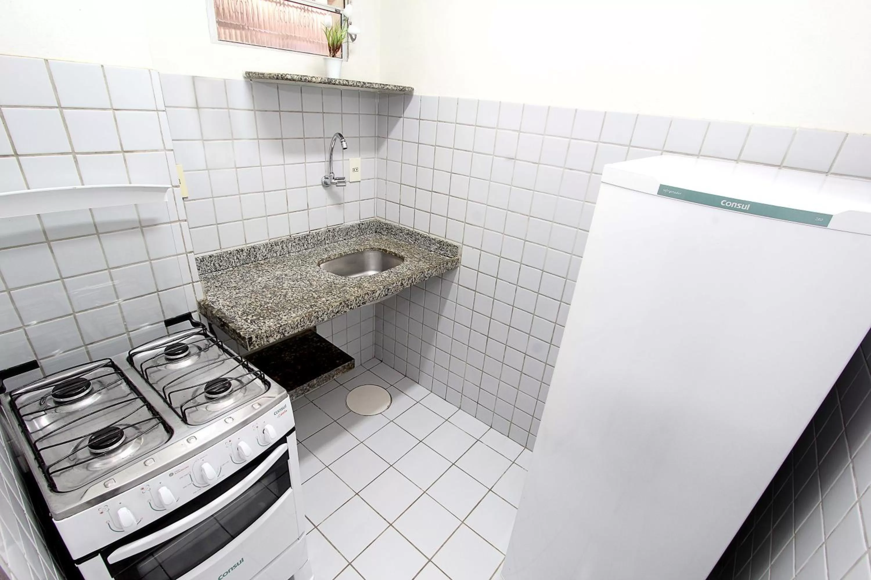 Kitchen or kitchenette in Praia Apart Hotel