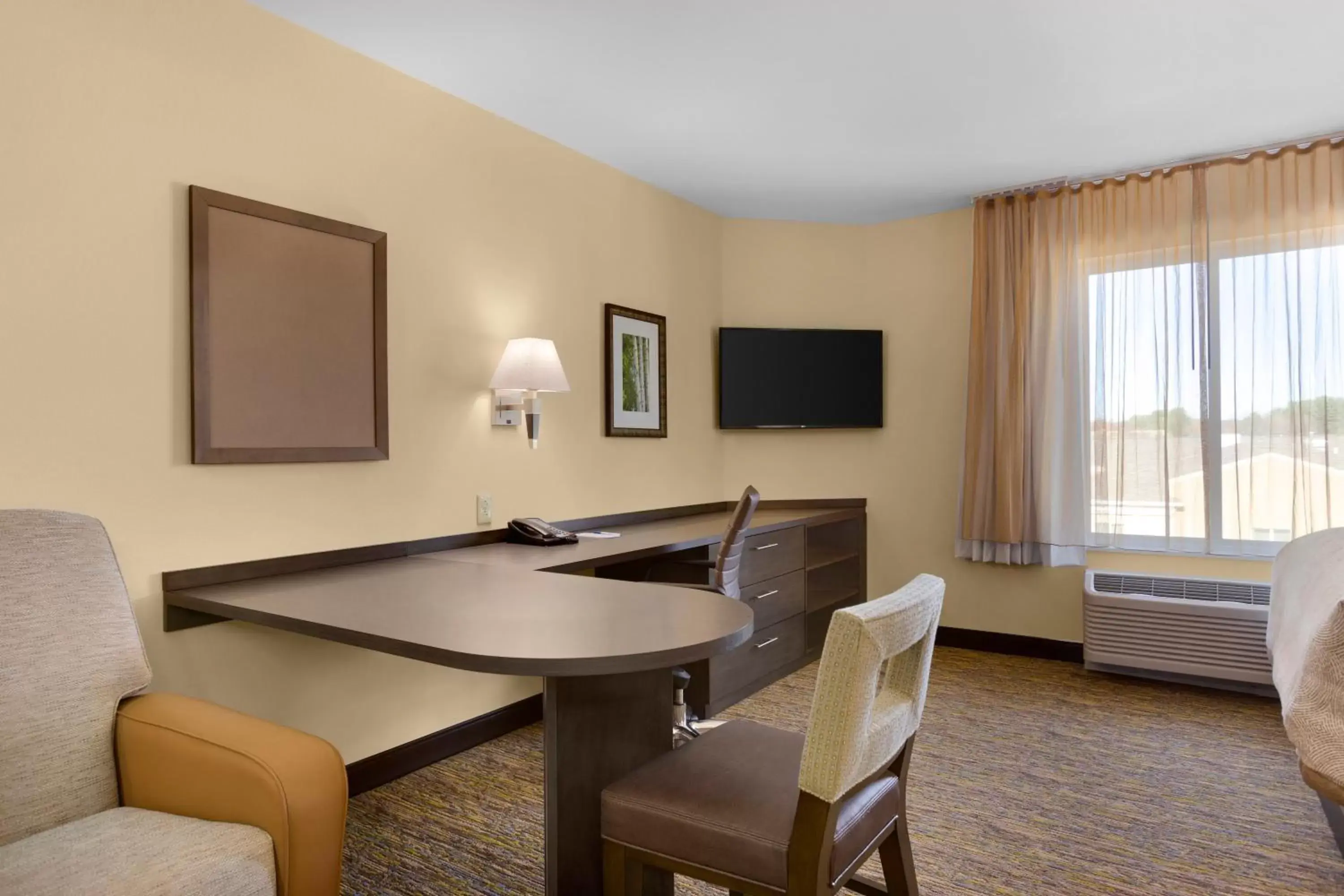 Photo of the whole room, TV/Entertainment Center in Candlewood Suites Vestal - Binghamton, an IHG Hotel