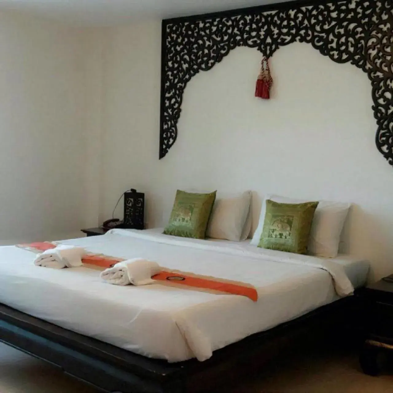 Bed in Wangburapa Grand Hotel