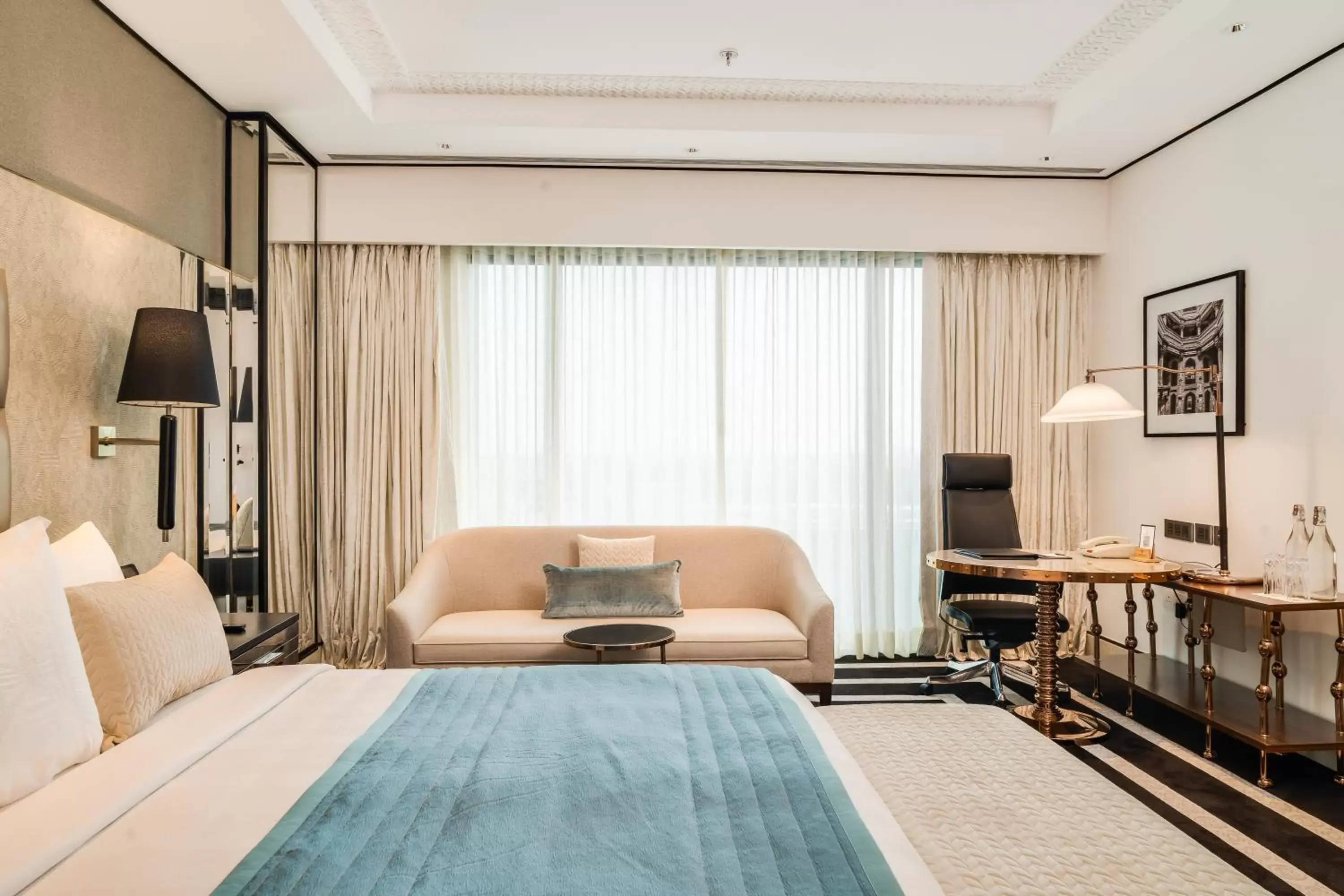 Bedroom, Seating Area in ITC Narmada, a Luxury Collection Hotel, Ahmedabad