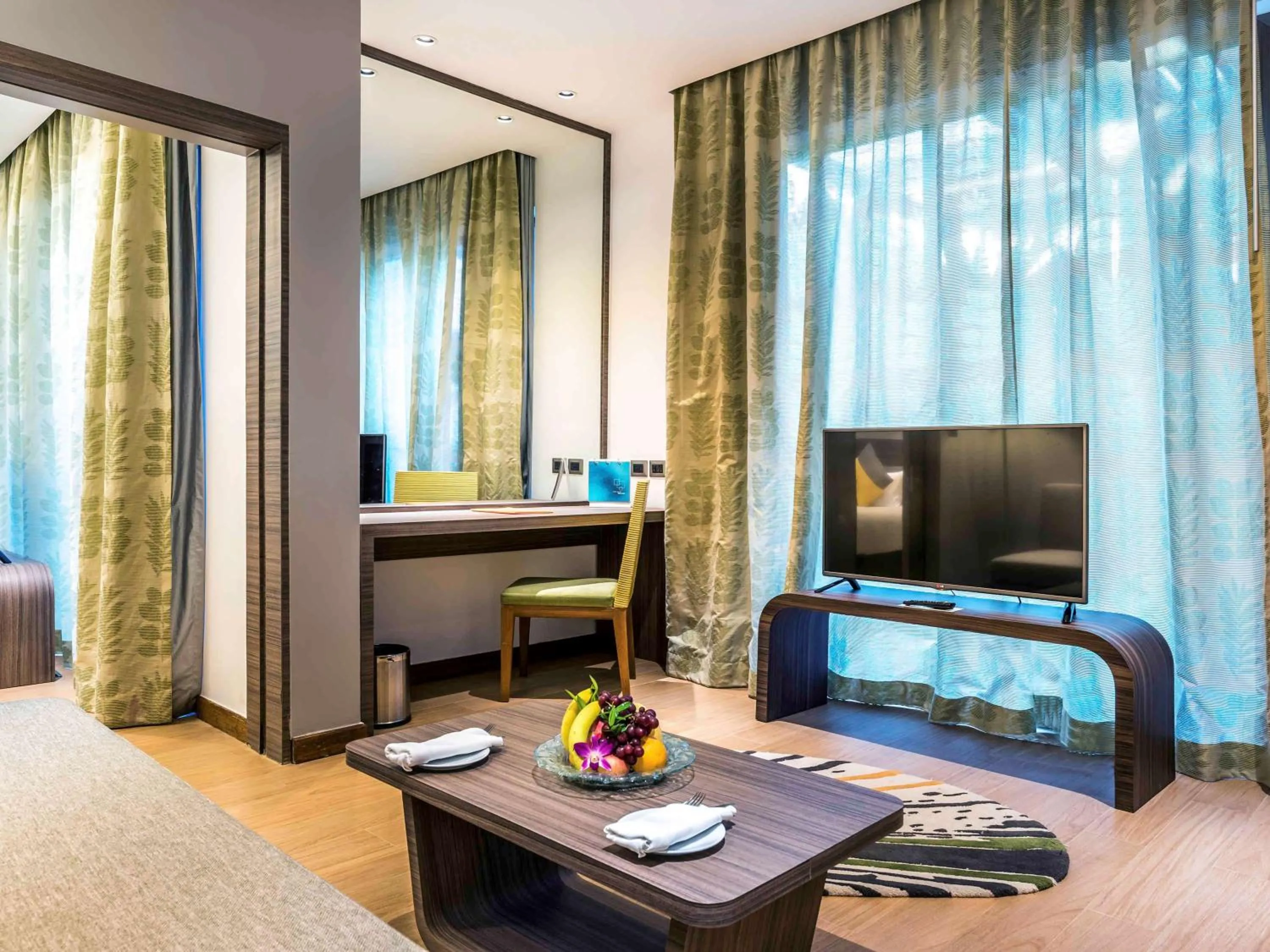 Photo of the whole room, TV/Entertainment Center in Destination Resorts Phuket Karon Beach - SHA Extra Plus