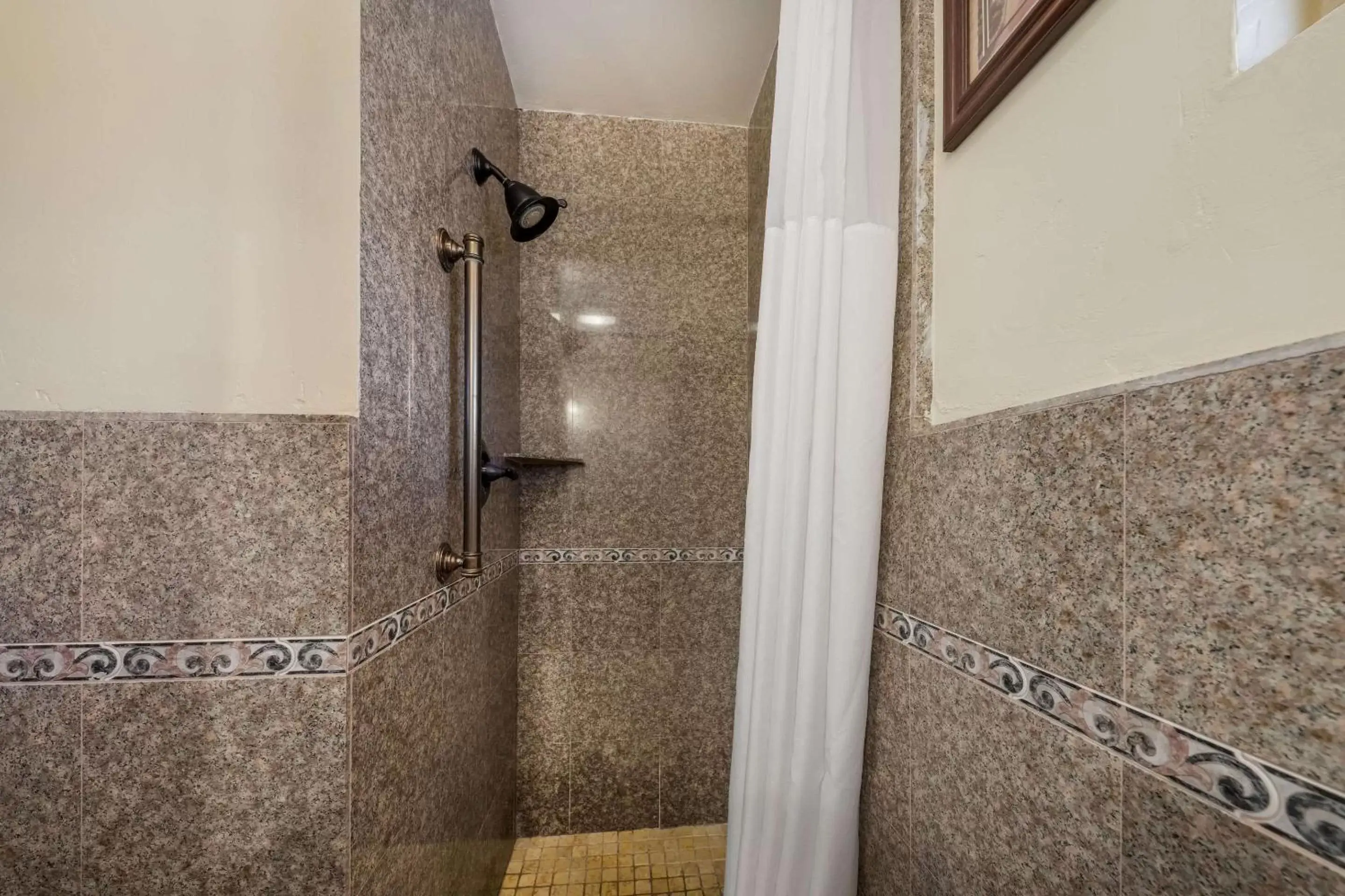 Shower, Bathroom in Clarion Collection Carmel Oaks Inn