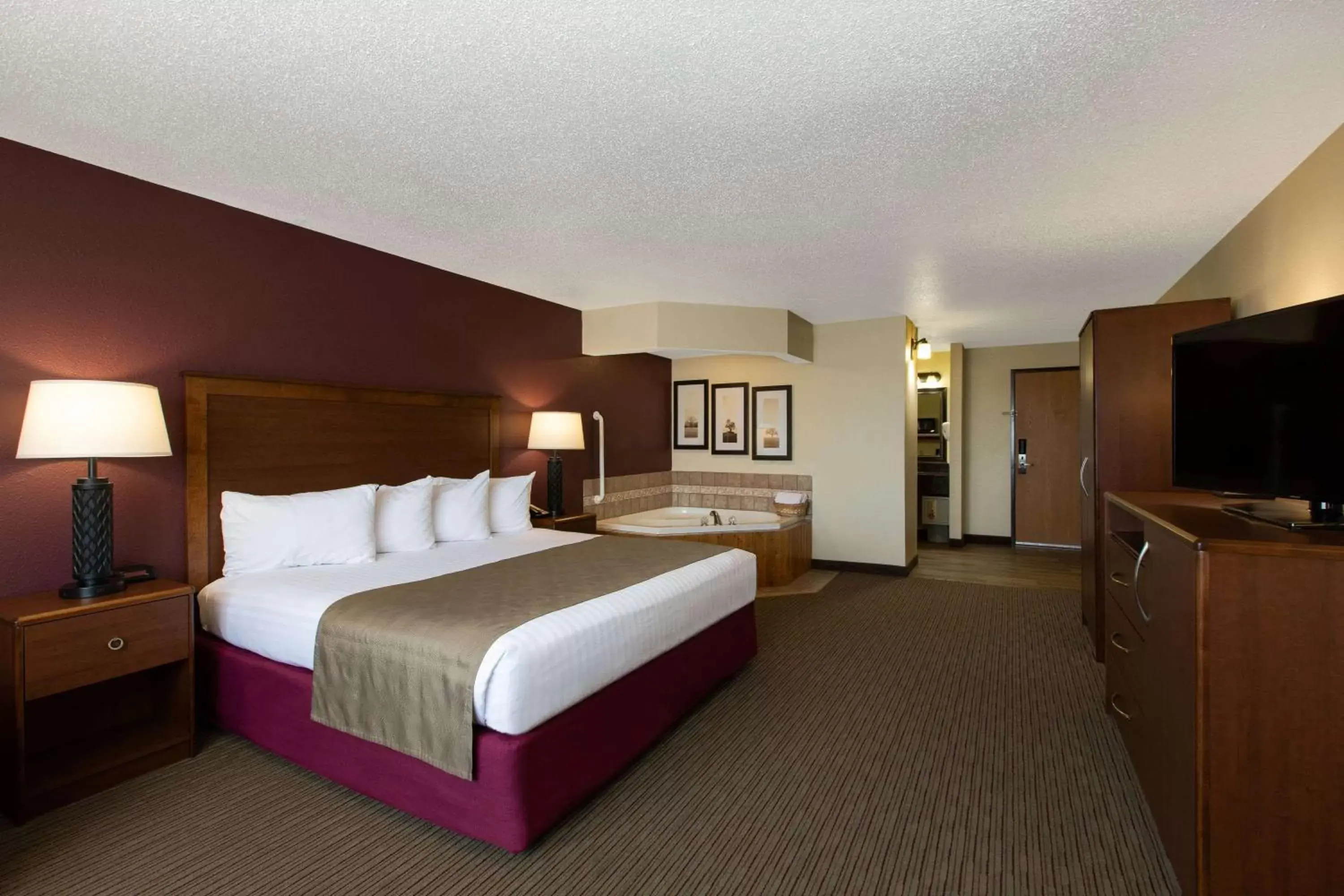 Photo of the whole room, Bed in AmericInn by Wyndham Merrill