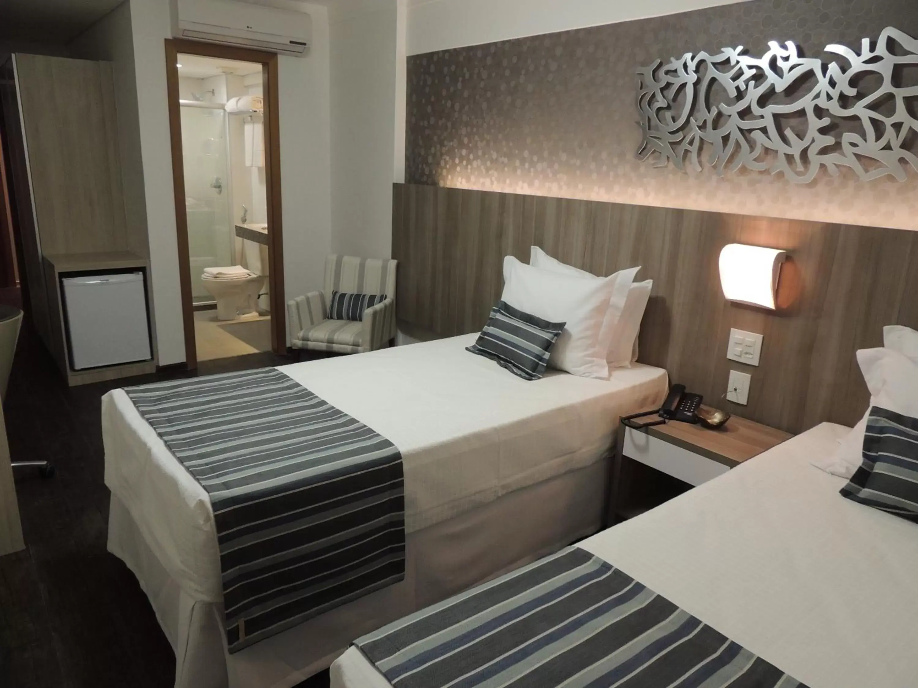 Bed in Allia Gran Pampulha Suites