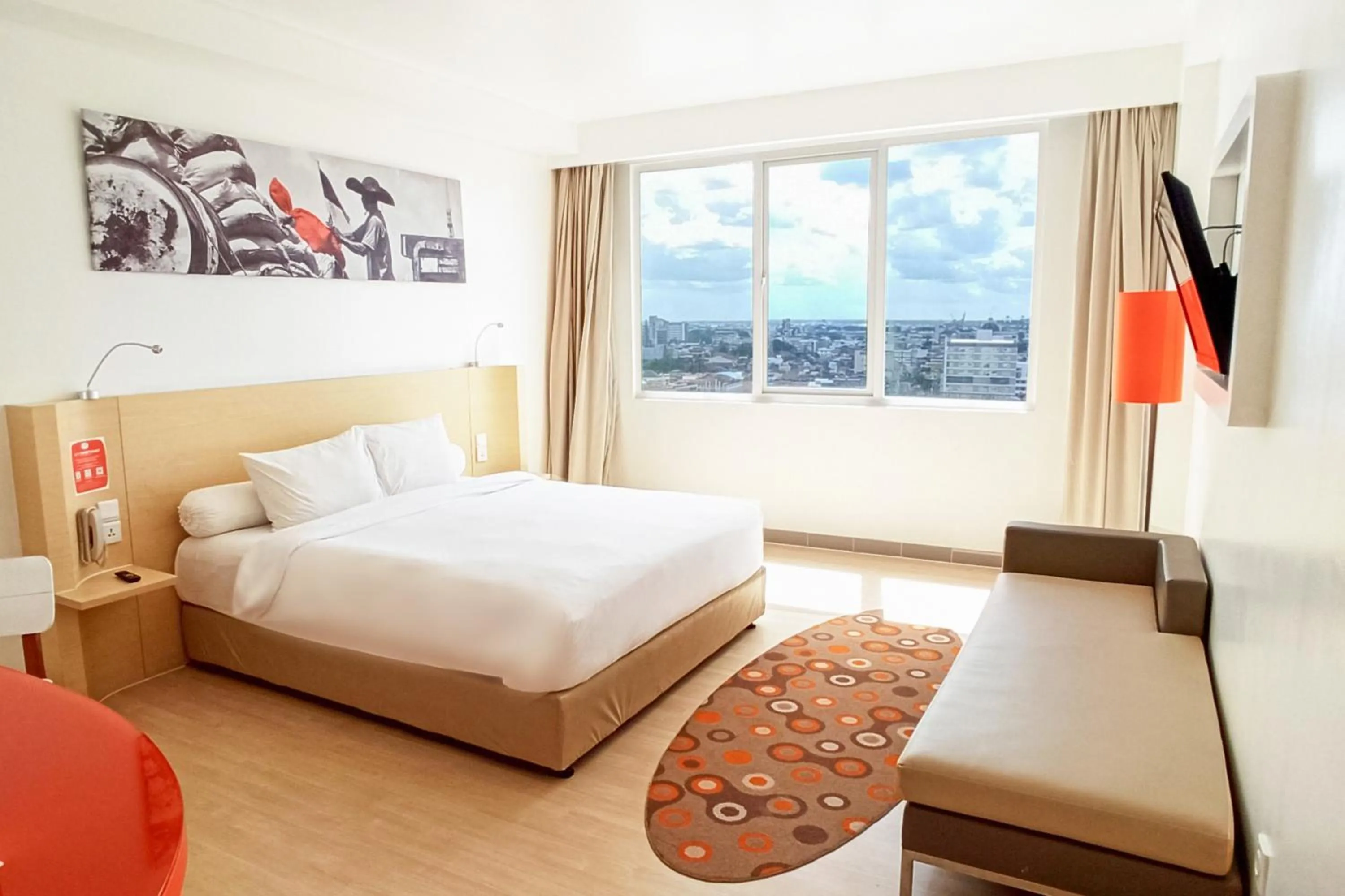 Bedroom, Bed in HARRIS Hotel Pontianak