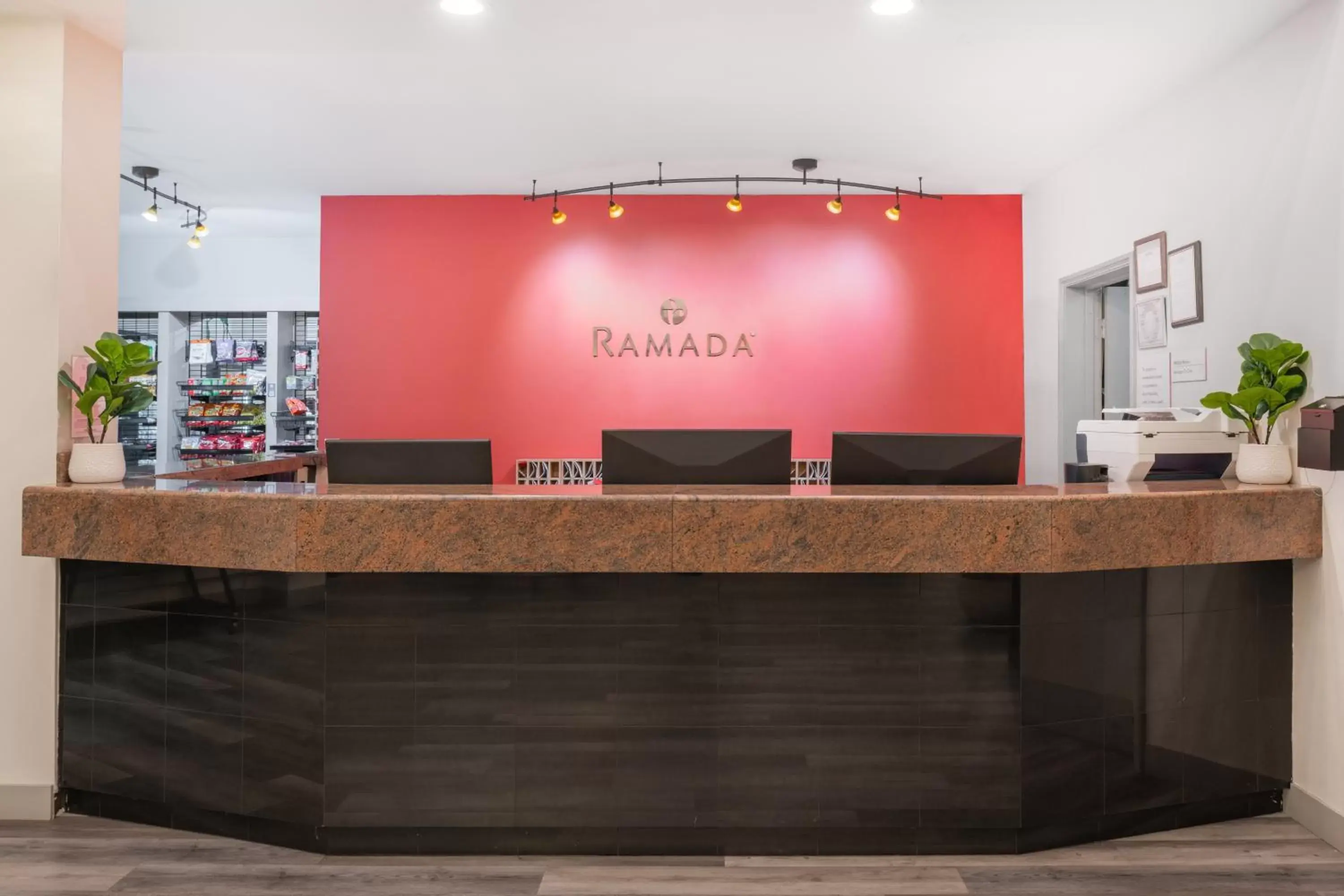 Property logo or sign in Ramada by Wyndham Bakersfield